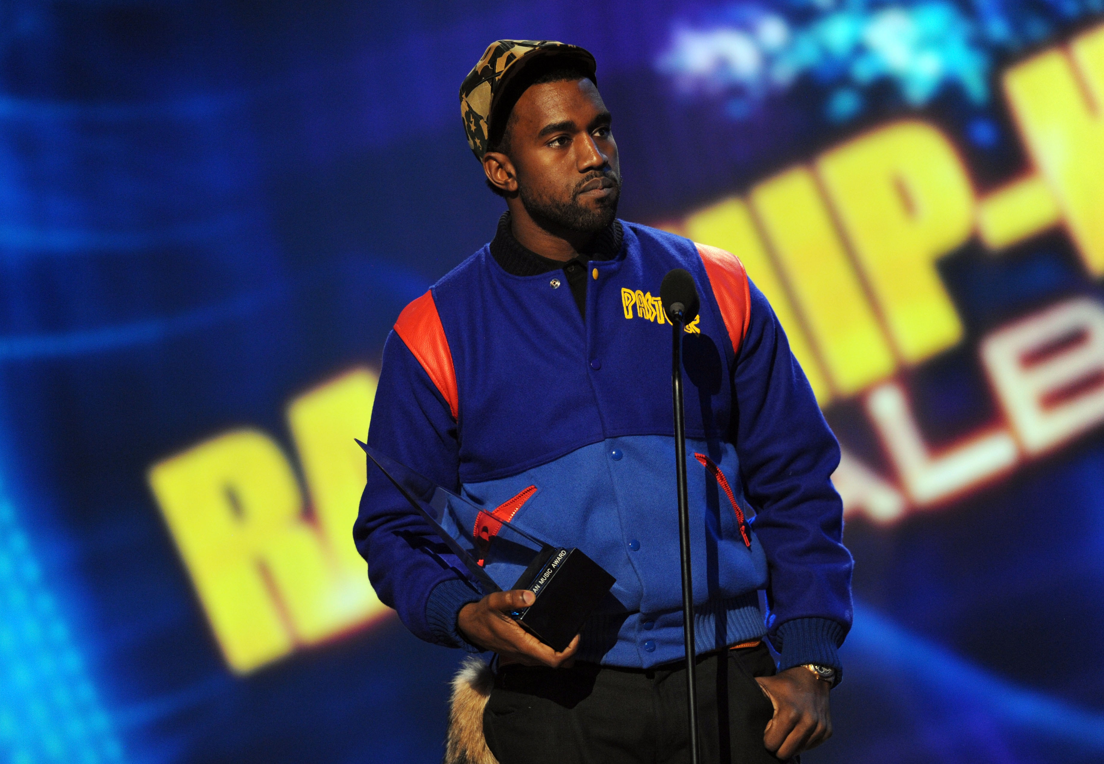 Kanye West in a Pastelle varsity jacket at the 2008 AMAs. 