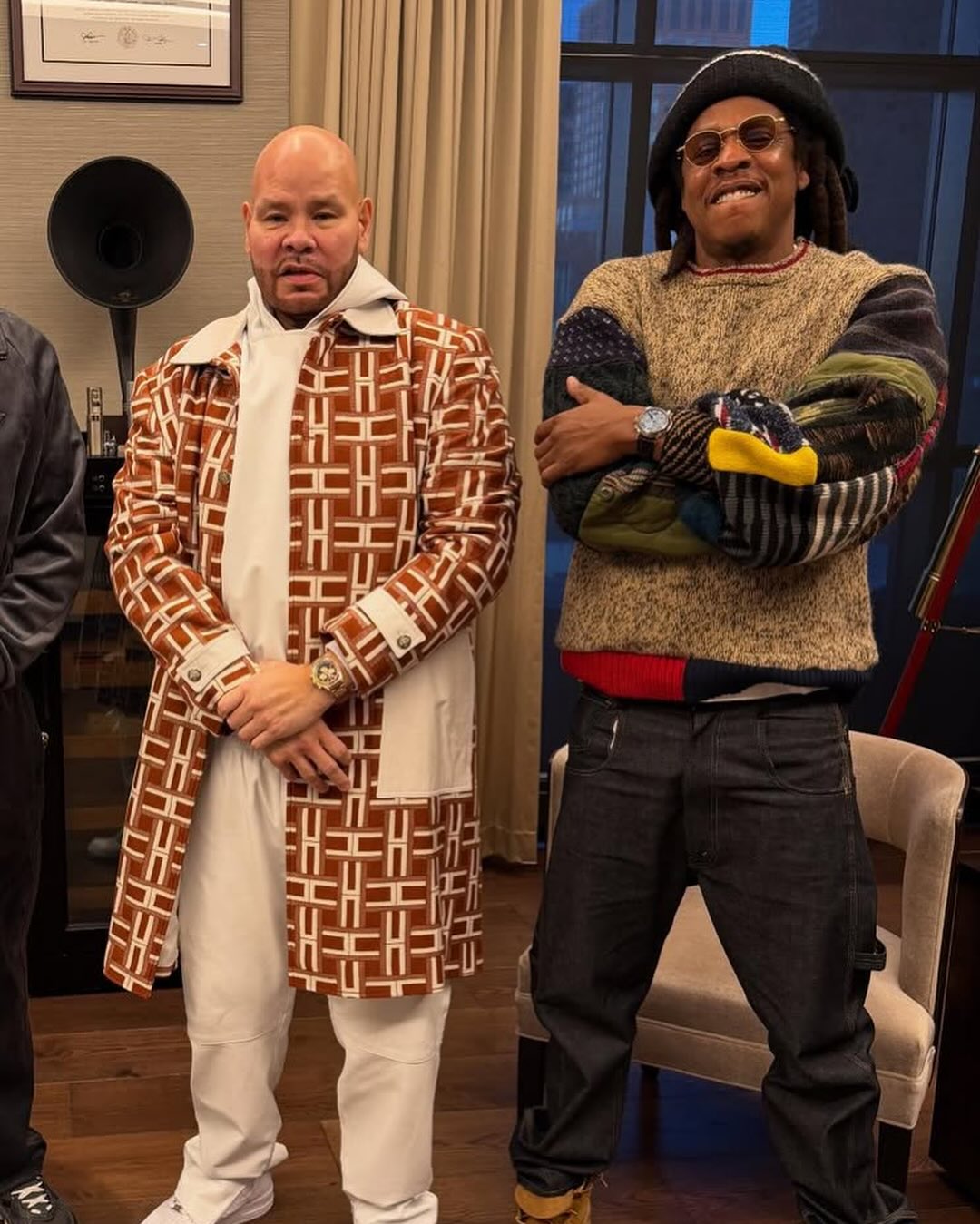 Jay-Z wearing his viral upcycled sweater designed by Japanese artist Asaka Fushimi.