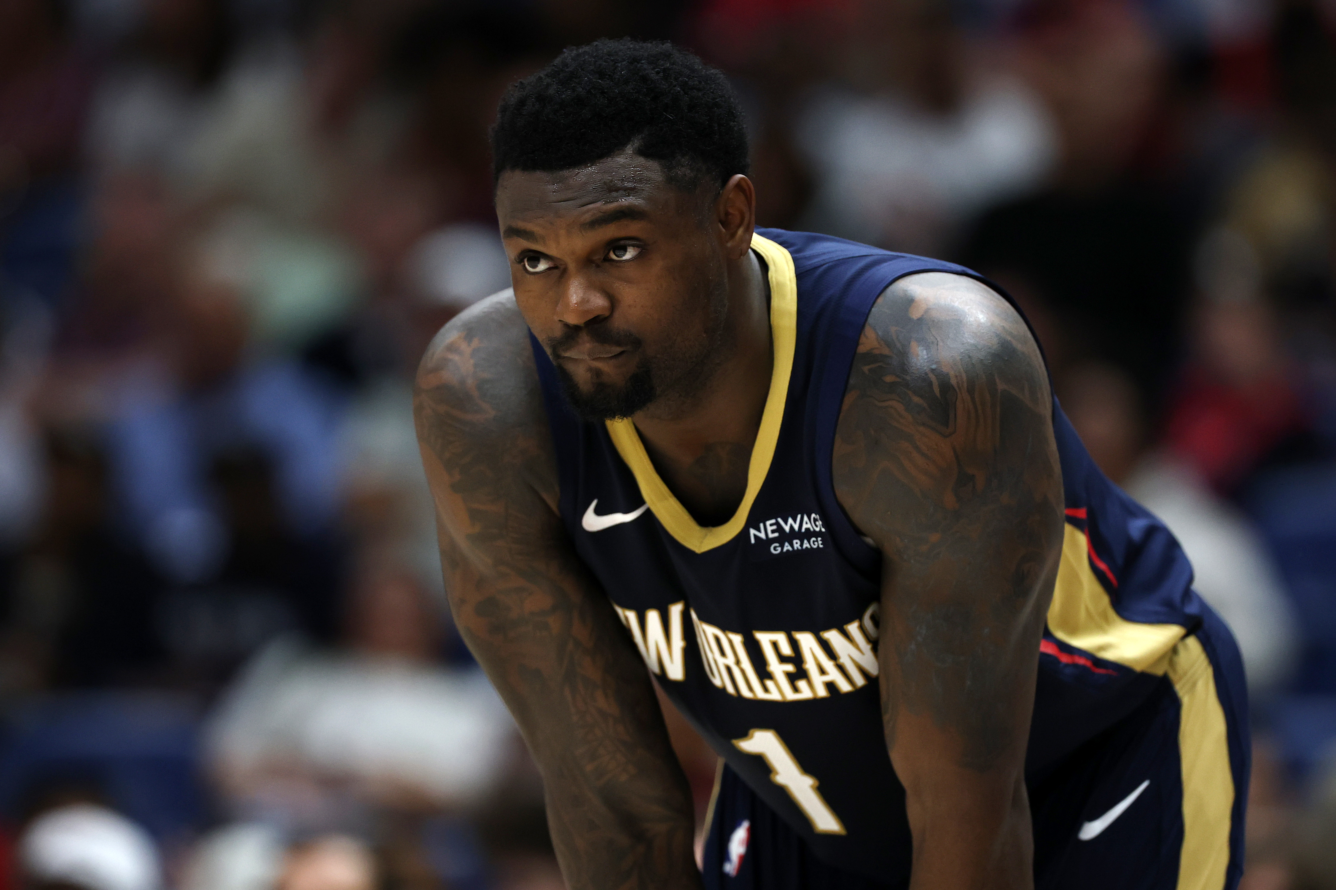 New Orleans Pelicans forward Zion Williamson looks on during a November 2025 game against the San Antonio Spurs.