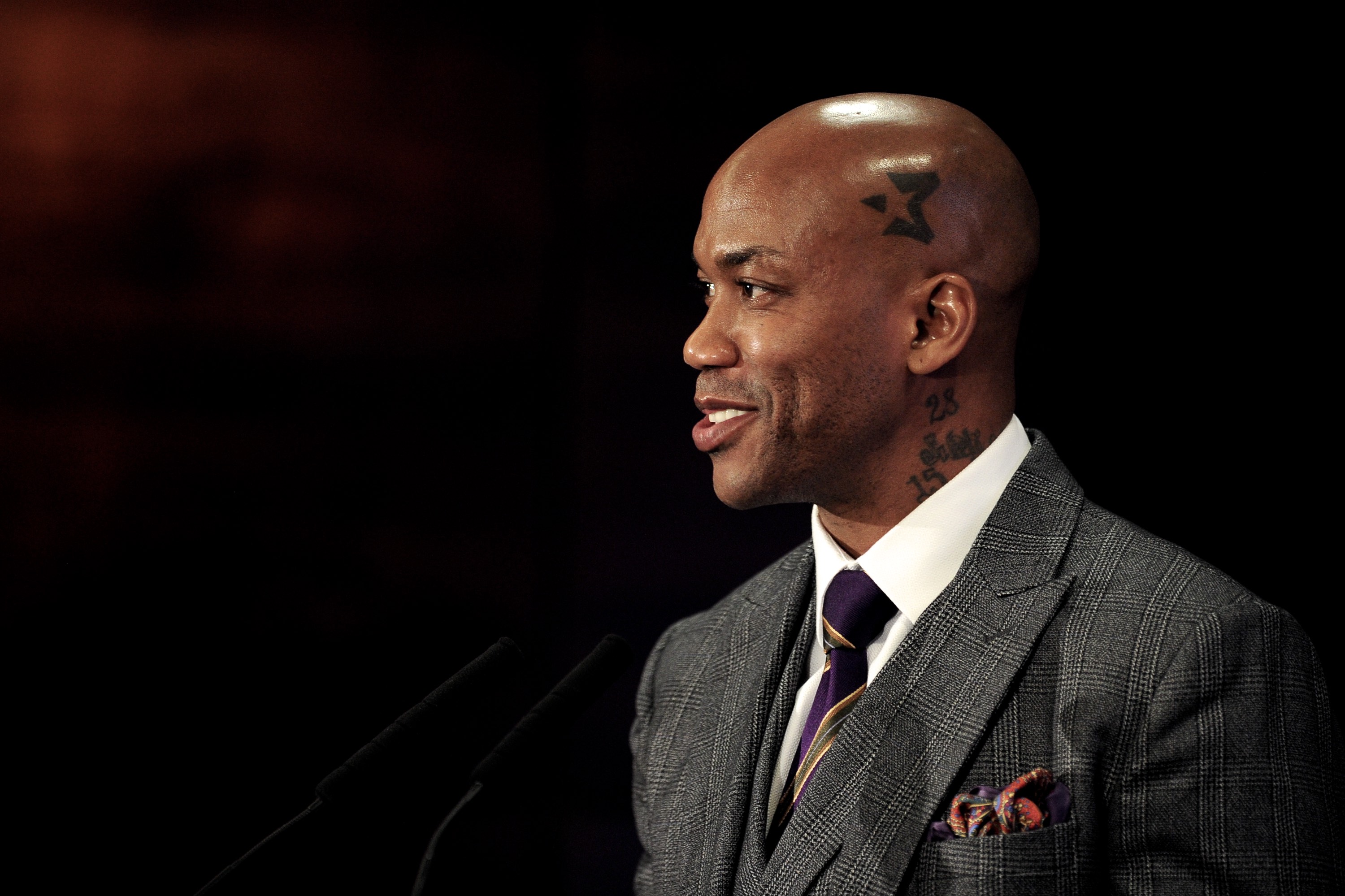 Stephon Marbury fields questions from reporters after his final game in the Chinese Basketball League. 