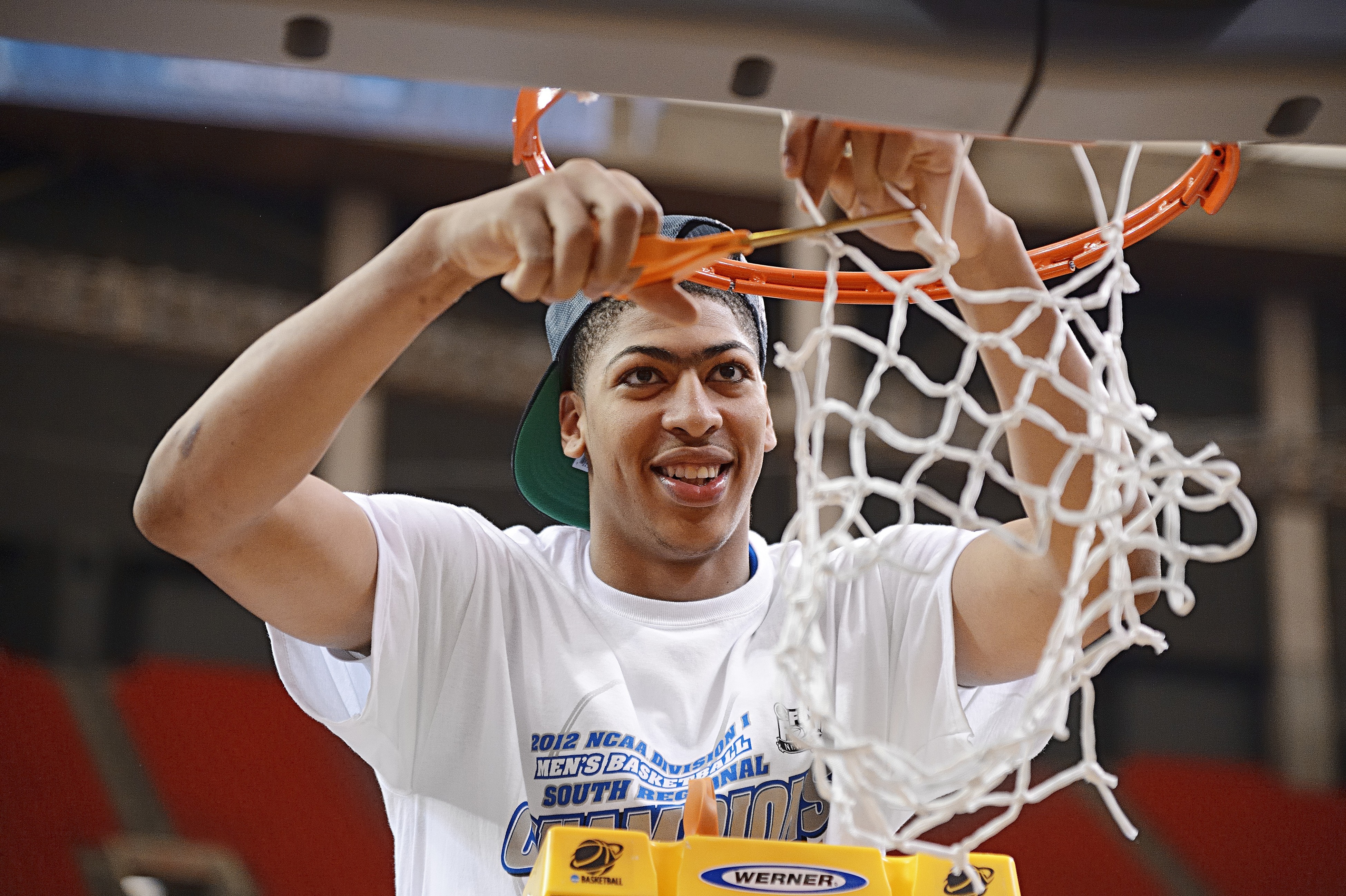Kentucky Wildcats freshman Anthony Davis cuts down the nets after winning the 2012 National Championship. 