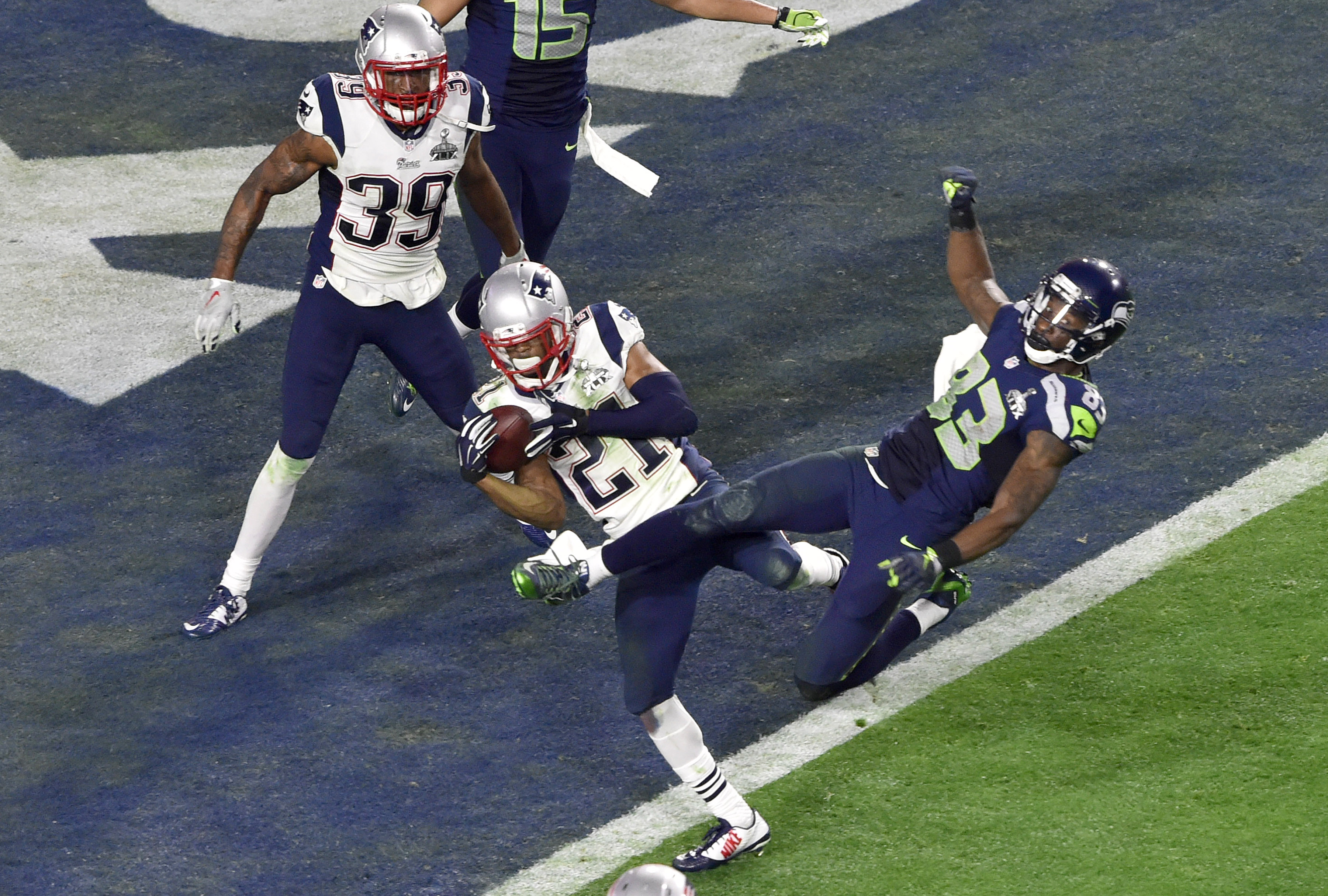 The Patriots Malcolm Butler steps in front of RIcardo Lockette and intercepts Russell Wilson to win Super Bowl XLIX.