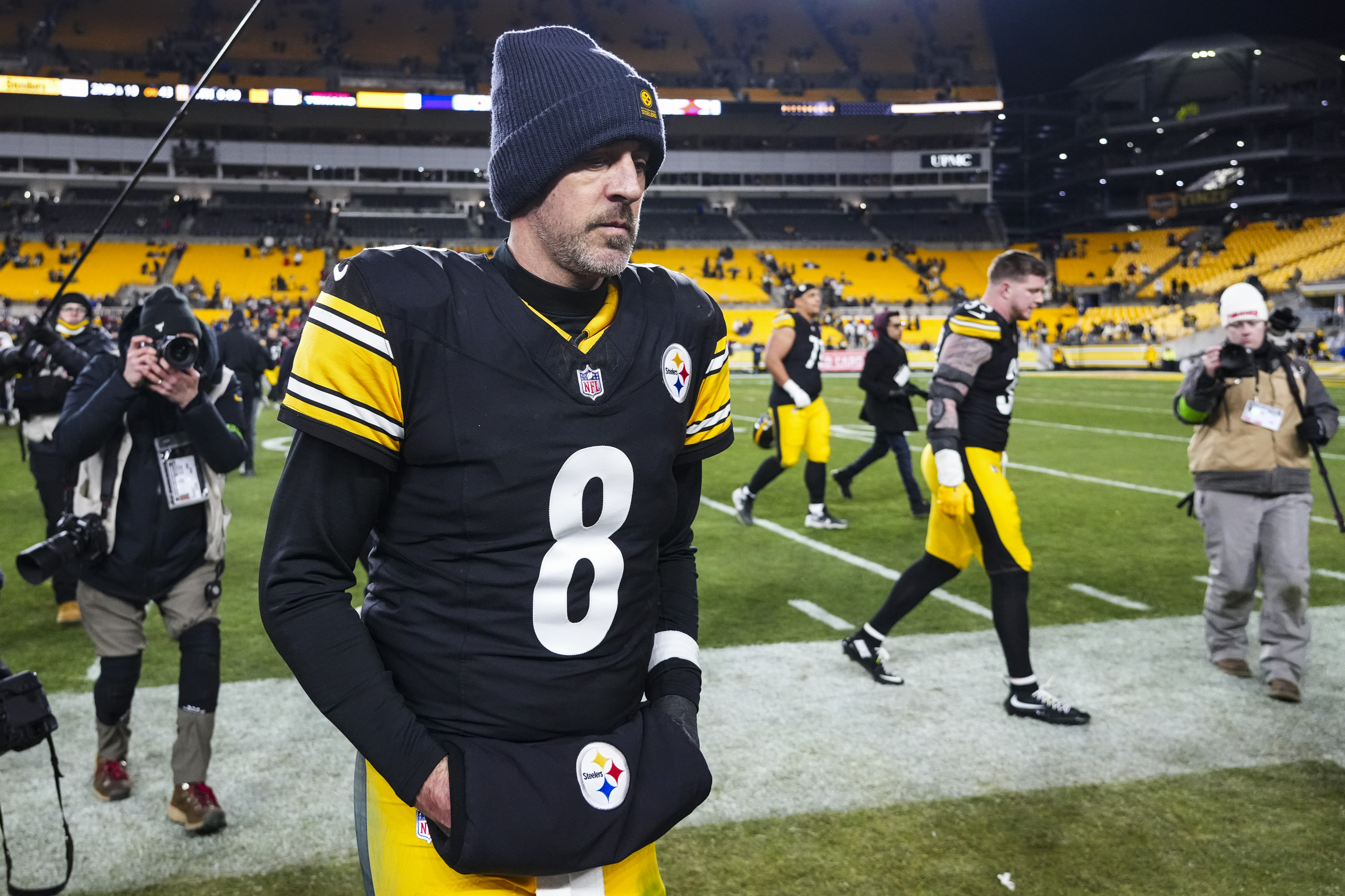 Pittsburgh Steelers quarterback Aaron Rodgers walks off the field following a loss to the Houston Texans in the 2026 AFC Wild Card.