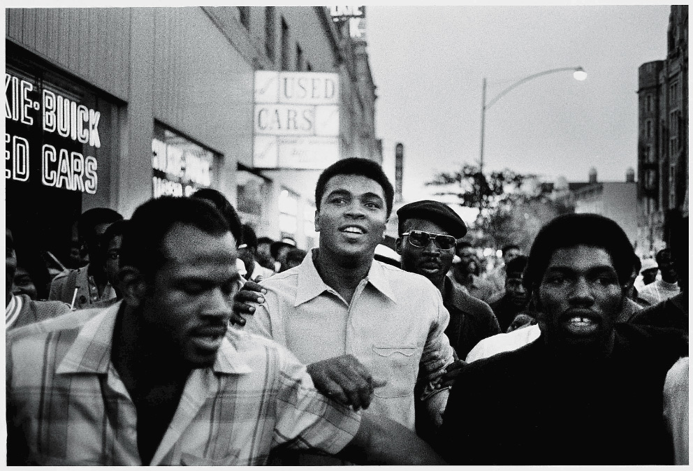 Muhammad Ali walks the streets of New York with members of the Black Panther Party in September 1970.