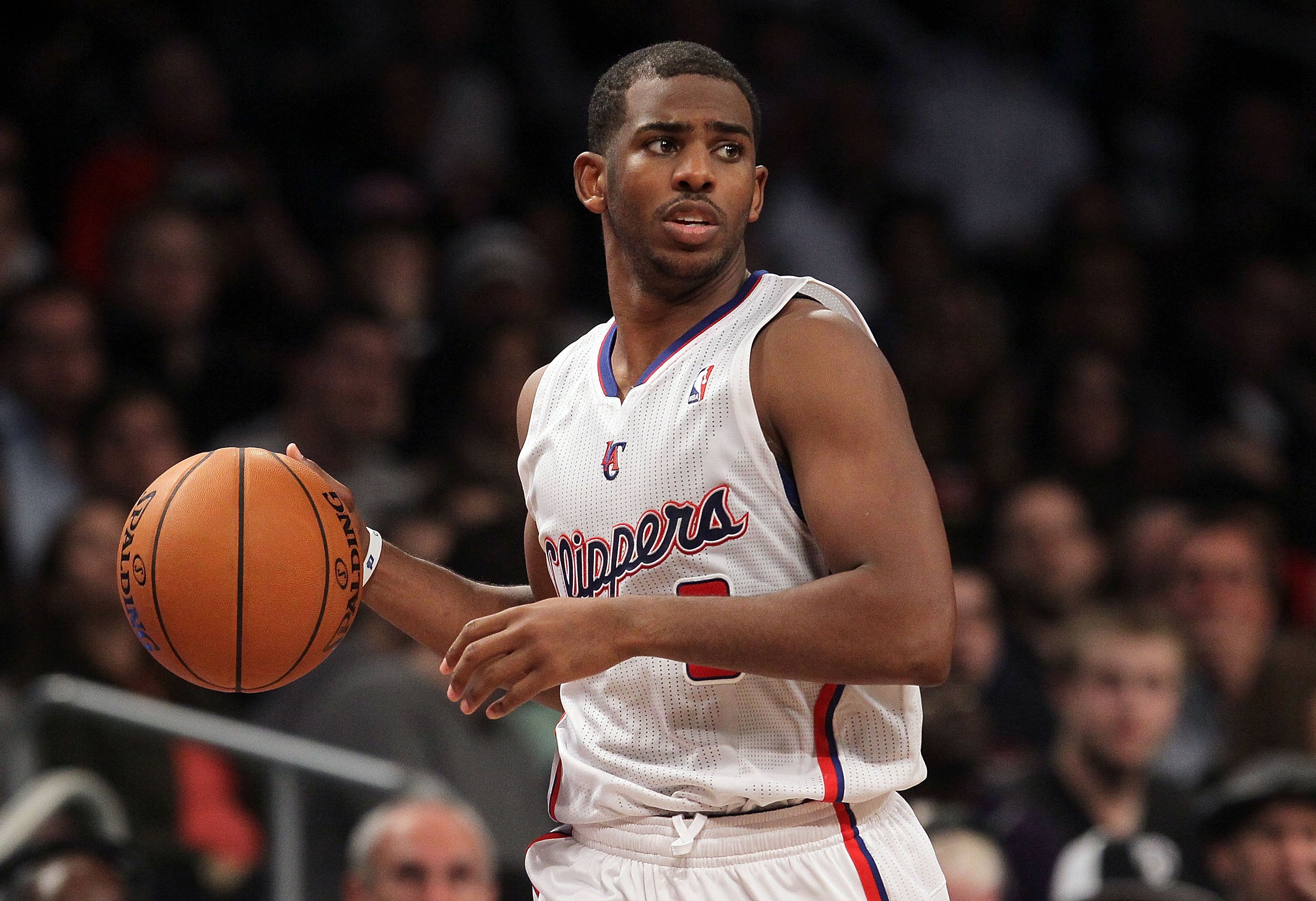 Chris Paul dribbles the ball up the court during a 2012 Clippers game.