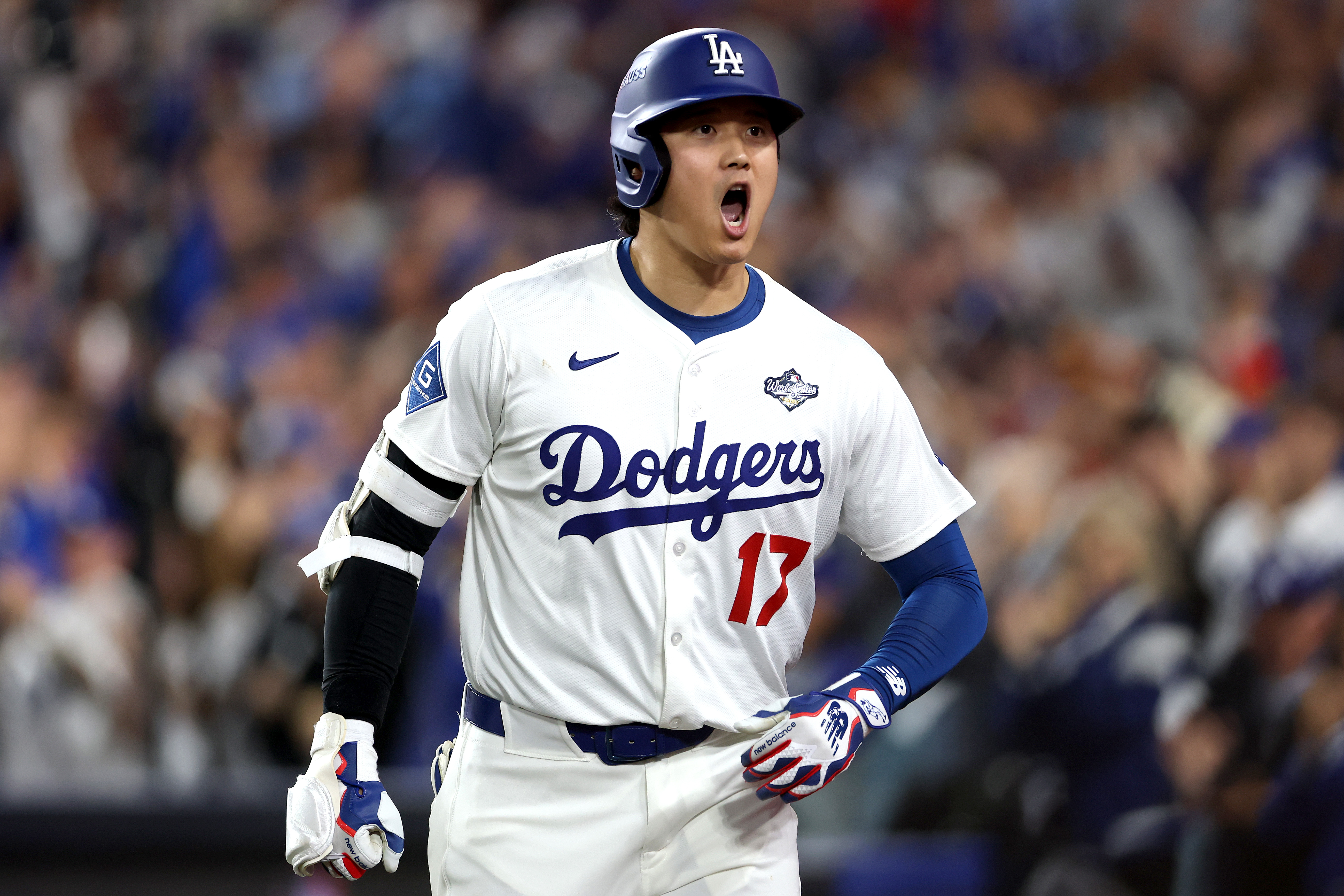 Shohei Ohtani of the Los Angeles Dodgers hits a home run in Game Three of the 2025 World Series. 
