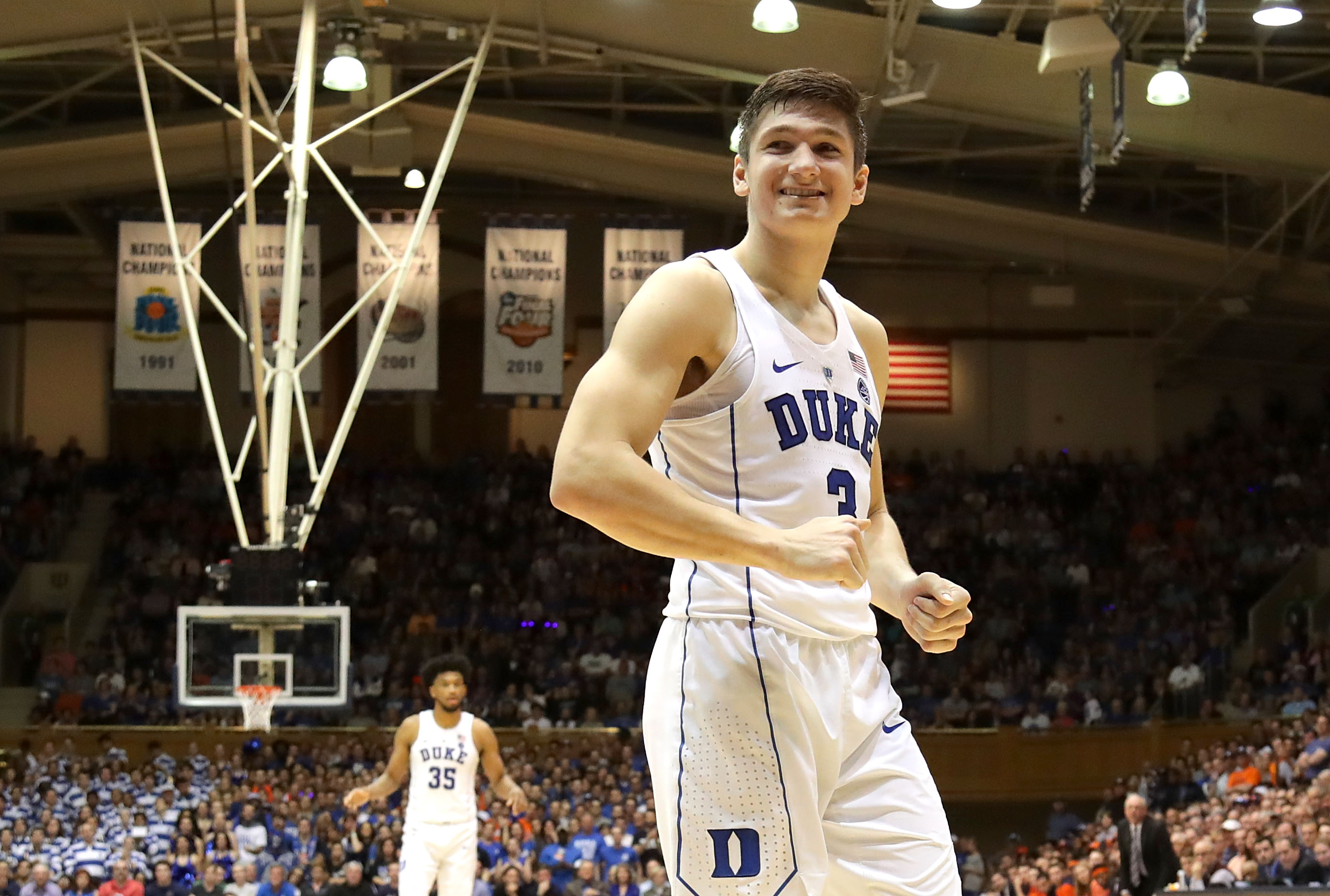 Grayson Allen smiles at the crowd during a Duke-Syracuse game in February 2018. 