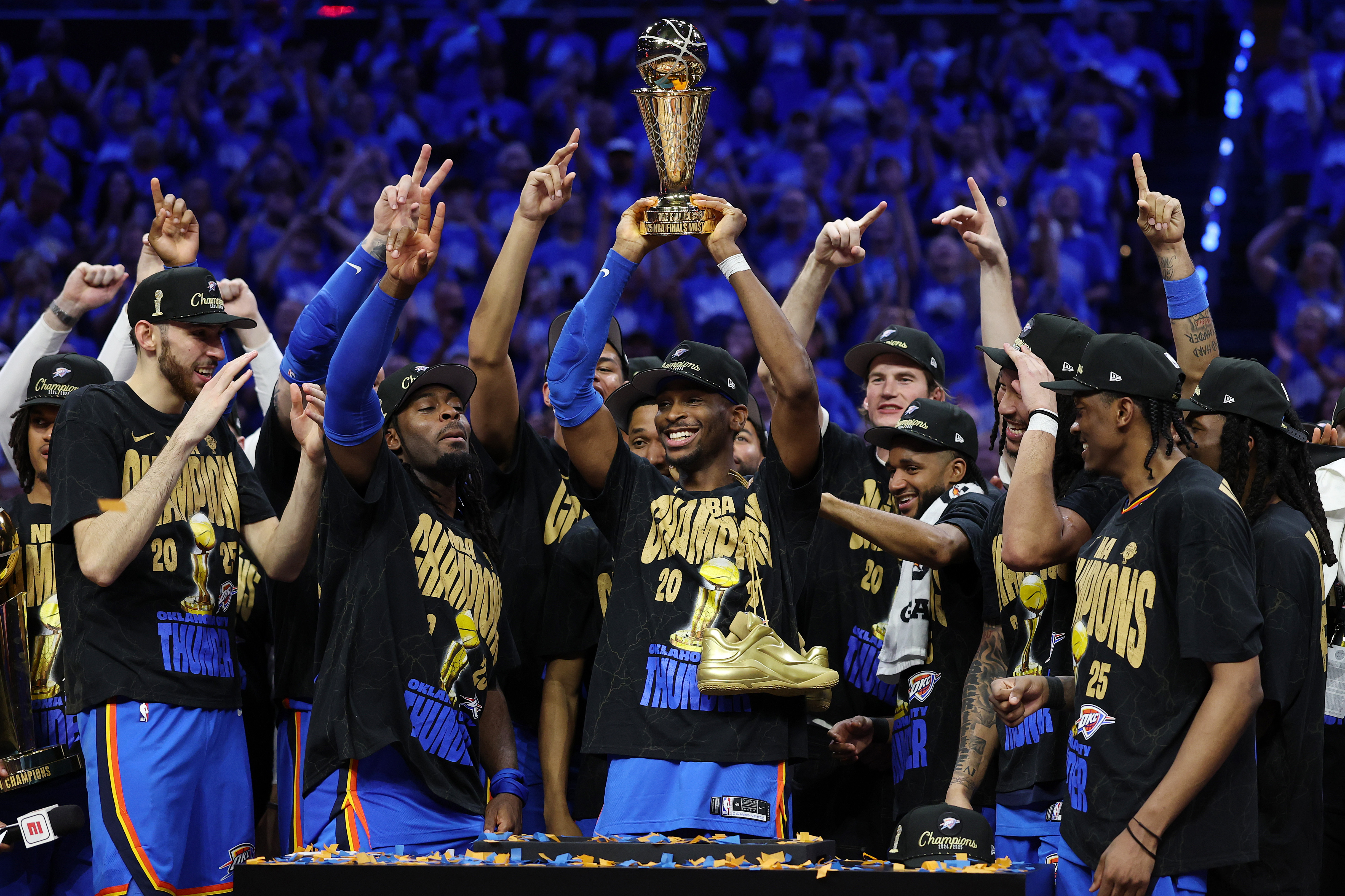 Shai Gilgeous-Alexander and the Oklahoma City Thunder celebrate winning the 2025 NBA Championship. 