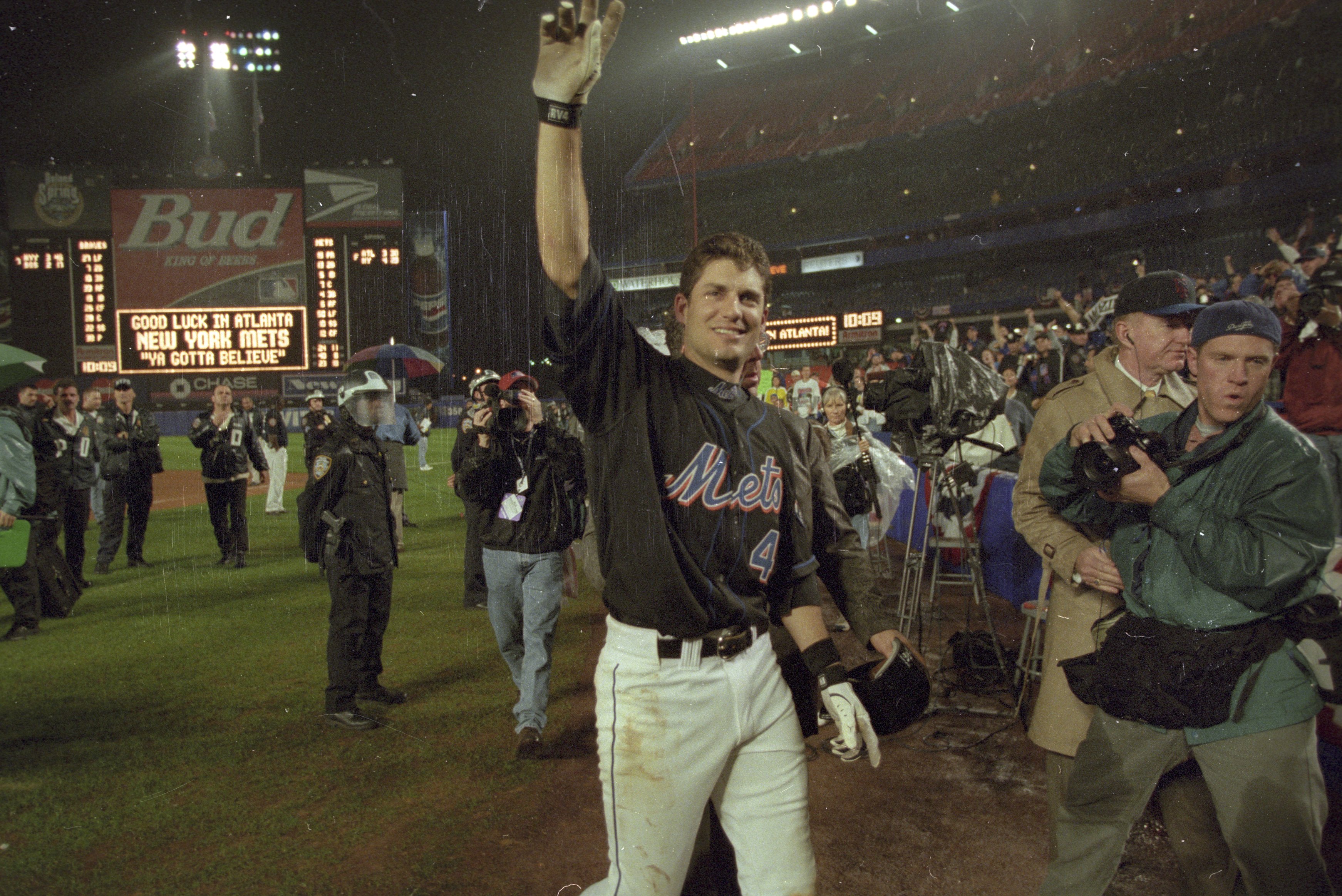 Robin Ventura walks off the field following his Grand Slam Single in Game 5 of the 1999 NLCS between the New York Mets and Atlanta Braves.