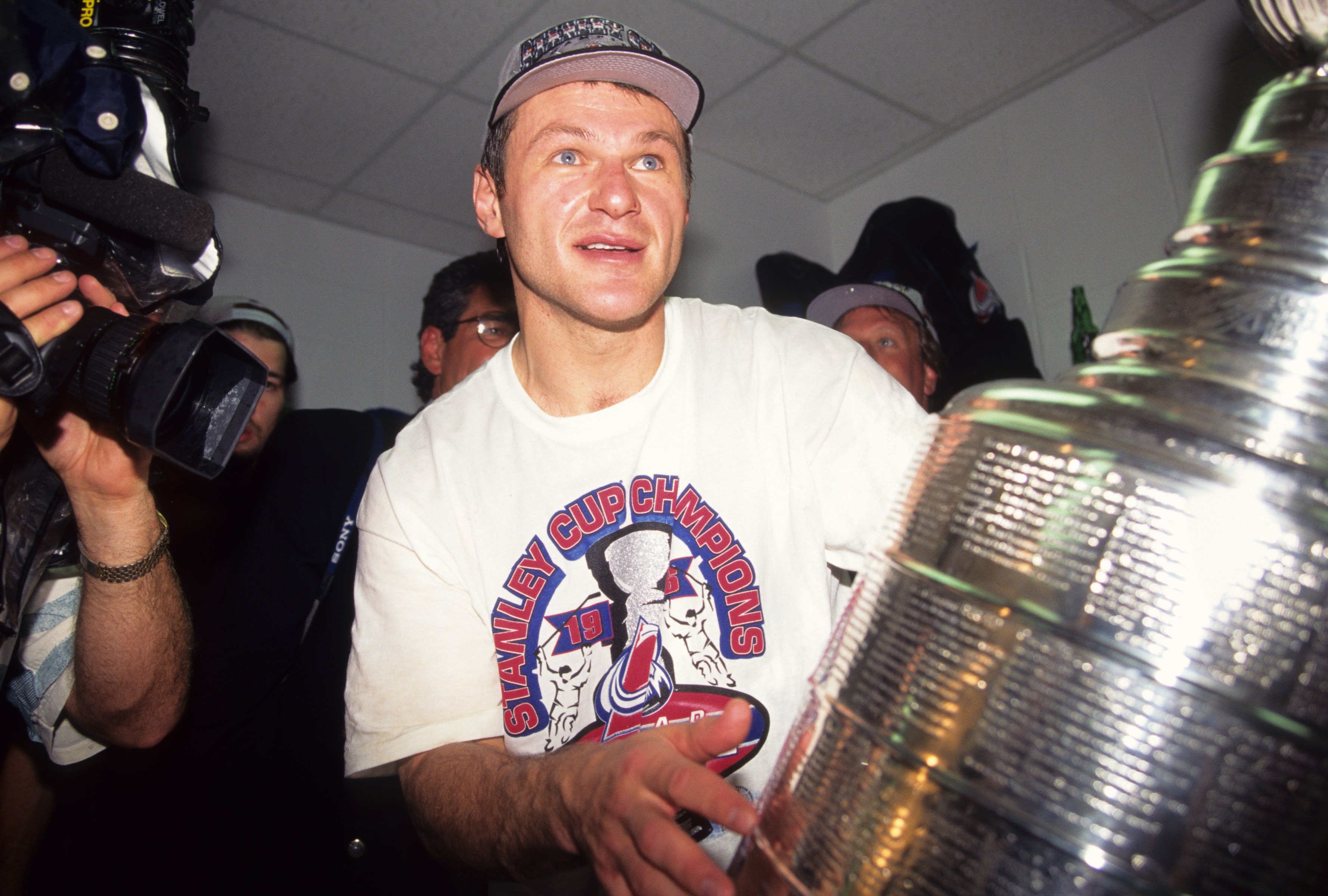 Claude Lemieux celebrates with the Stanley Cup after the Colorado Avalanche won the 1996 Stanley Cup Championship. 