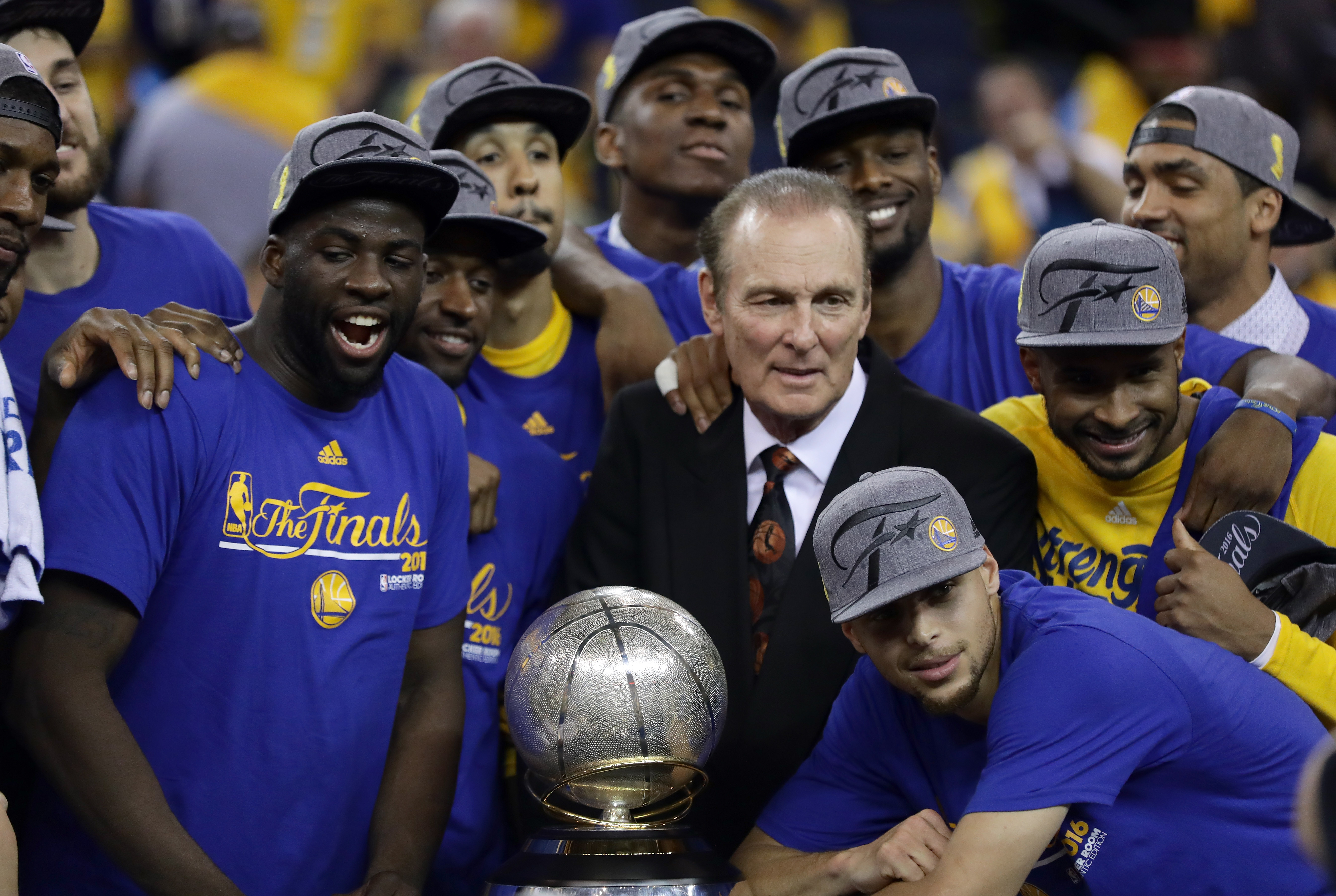 Stephen Curry, Draymond Green and the 2016 Golden State Warriors celebrate after winning the Western Conference Finals.