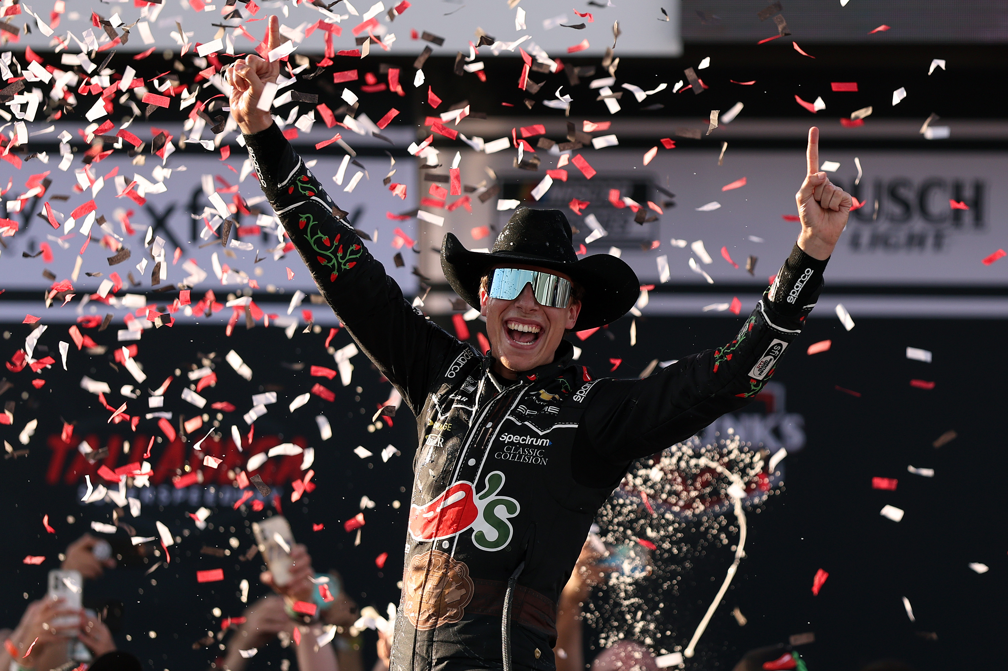 Carson Hocevar, driver of the #77 Chili's Ride the 'Dente Chevrolet, celebrates in victory lane after winning the NASCAR Cup Series Jack Link's 500 at Talladega Superspeedway on April 26, 2026 in Talladega, Alabama.
