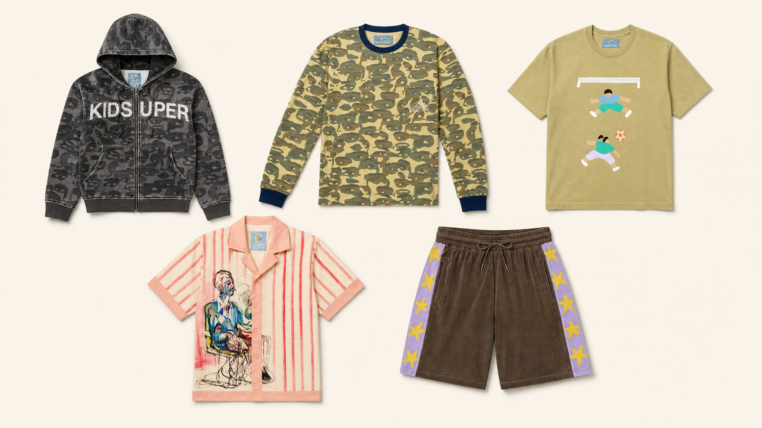 A collection of five clothing items: a camo hoodie, camo long-sleeve shirt, graphic T-shirt, striped shirt with art print, and star-patterned shorts.