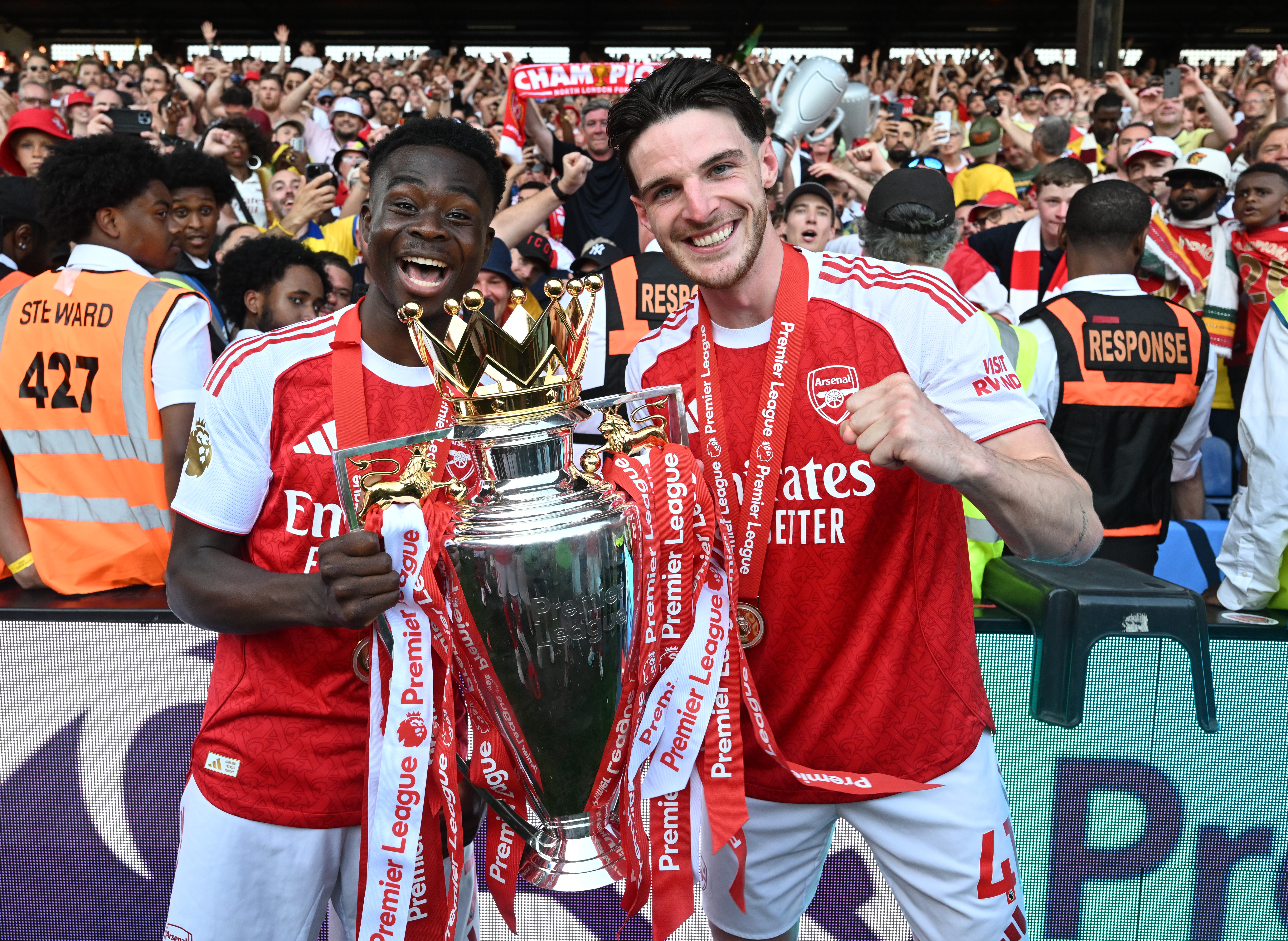 Bukayo Saka and Declan Rice celebrate after Arsenal clinched the Premier League title. 