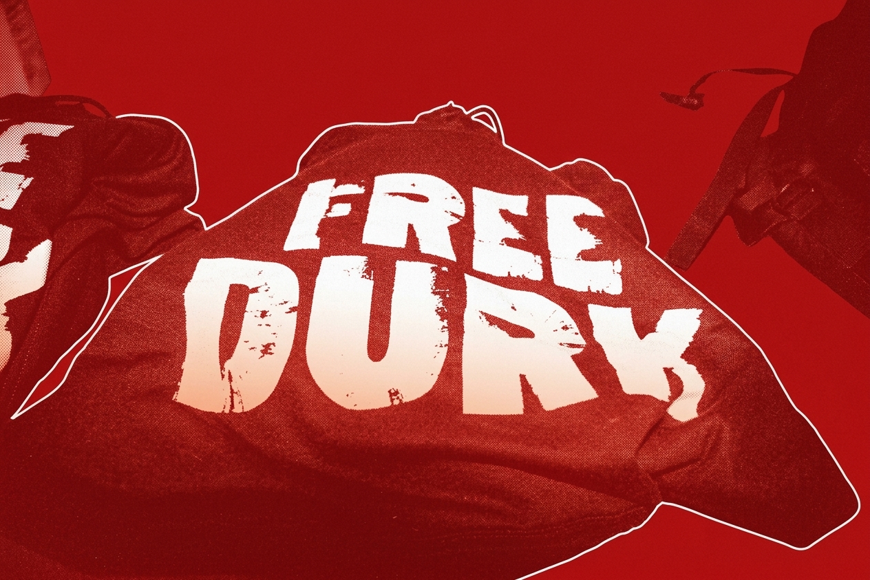 "Free Durk" shirts are seen during the AT&T Playoff Playlist Live! concert at State Farm Arena on January 18, 2025 in Atlanta, Georgia.