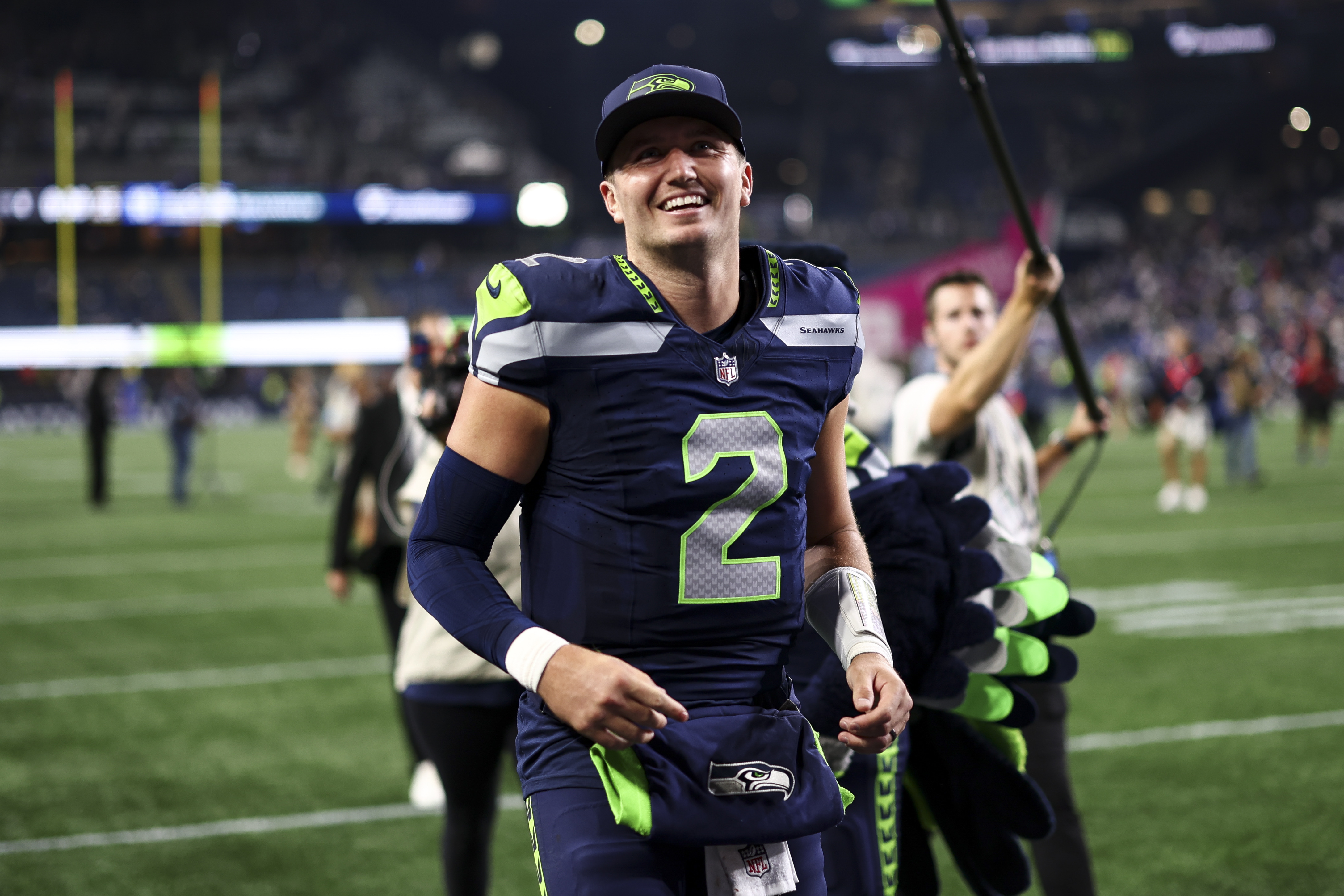 Drew Lock runs off the field after the Seattle Seahawks season opening win over the New England Patriots.