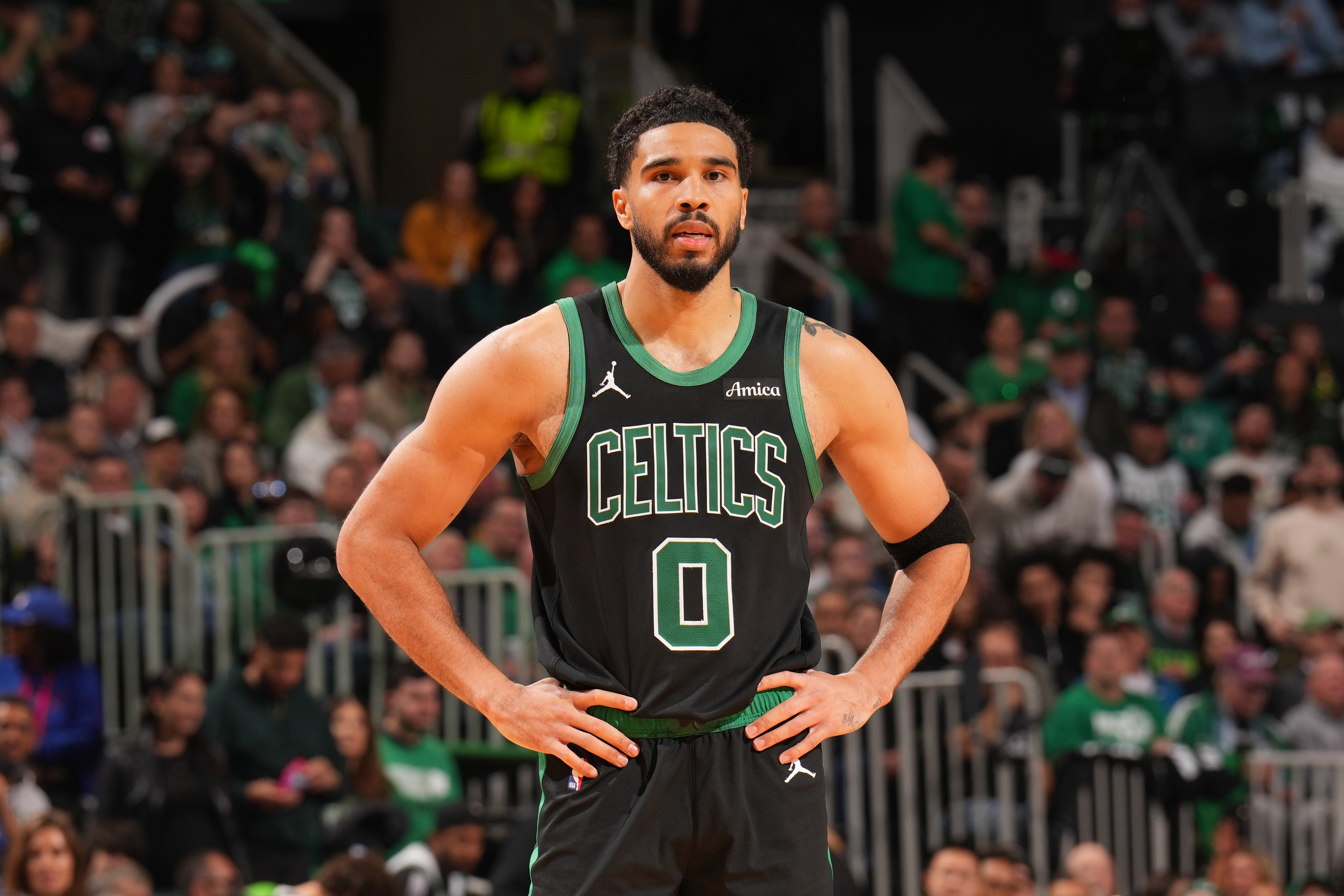 Jayson Tatum takes a breather during the Boston Celtics playoff series against the Philadelphia 76ers.