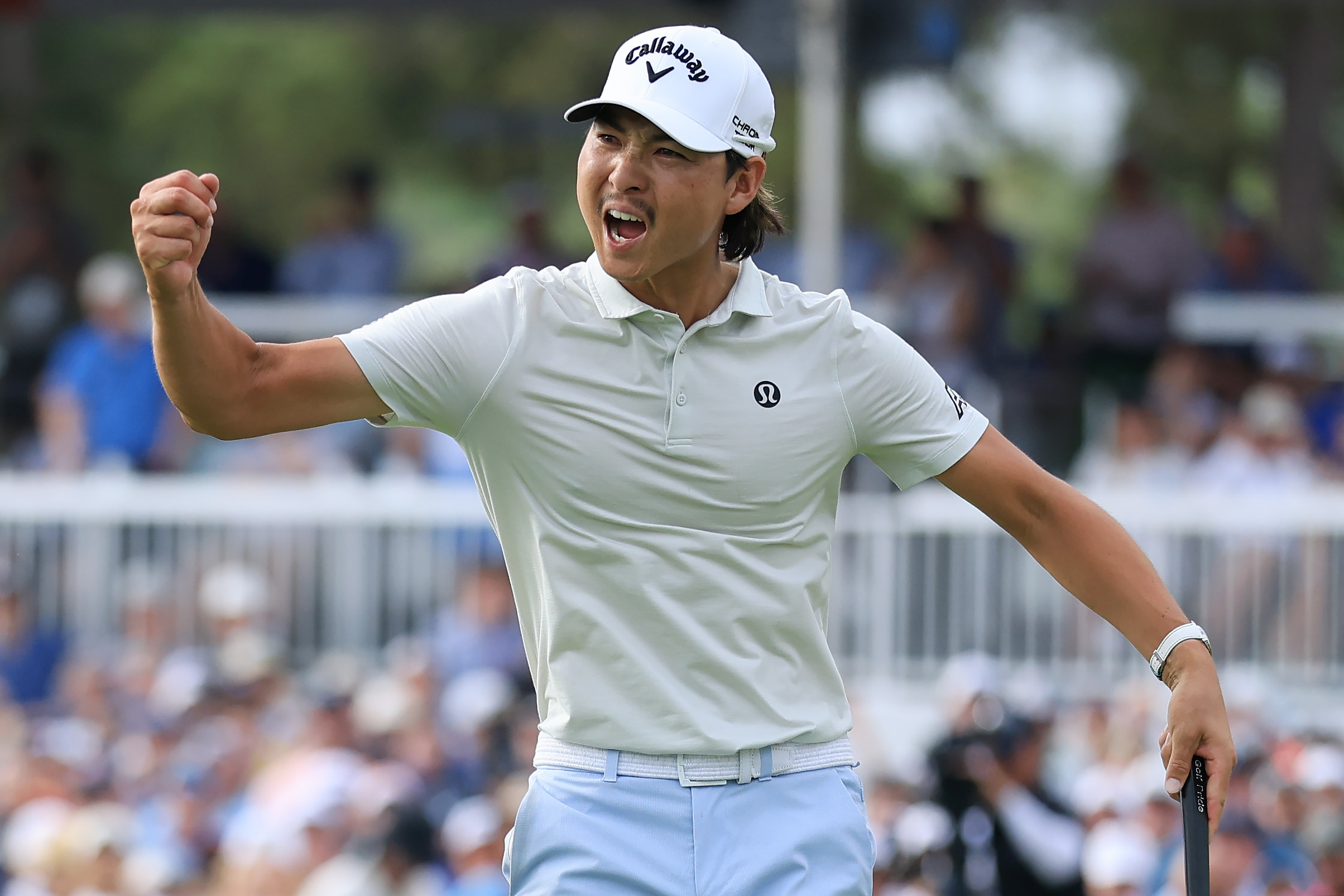 Min Woo Lee celebrates his winning putt at the Houston Open.