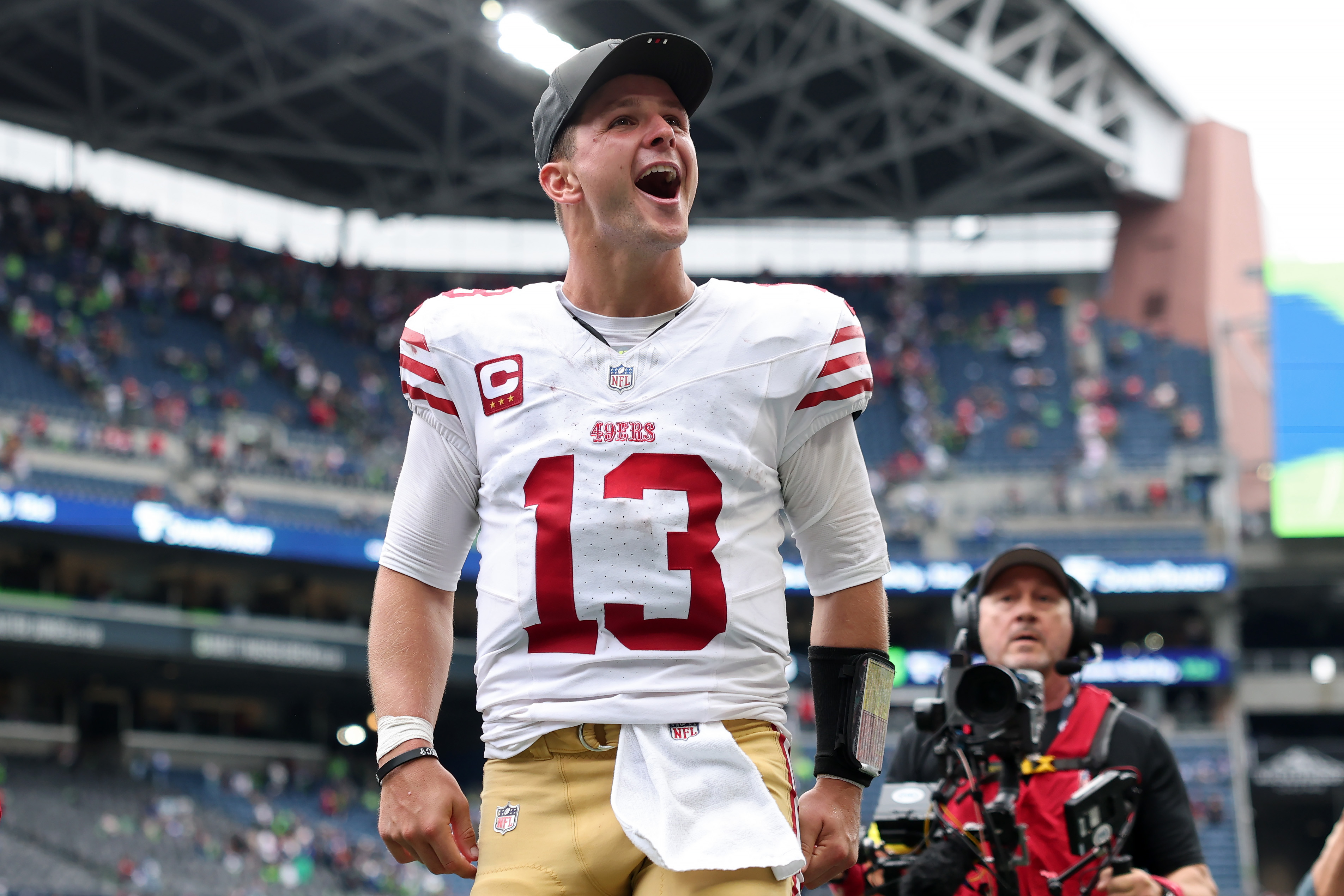Brock Purdy celebrates a San Francisco 49ers win over the Seattle Seahawks.