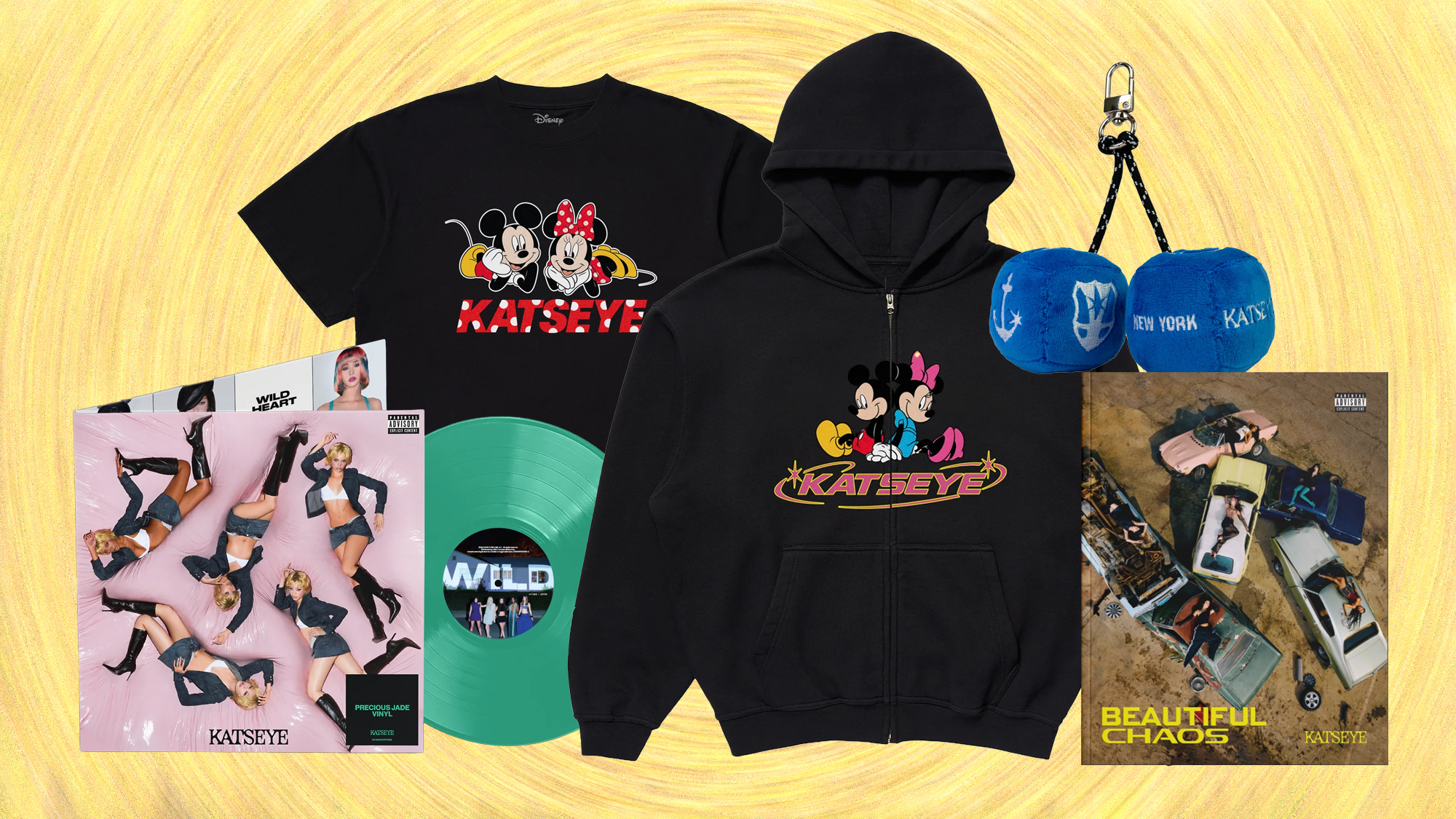 Merchandise set featuring Mickey and Minnie Mouse apparel, vinyl records, and keychains. Items include a black T-shirt, hoodie, and two albums.