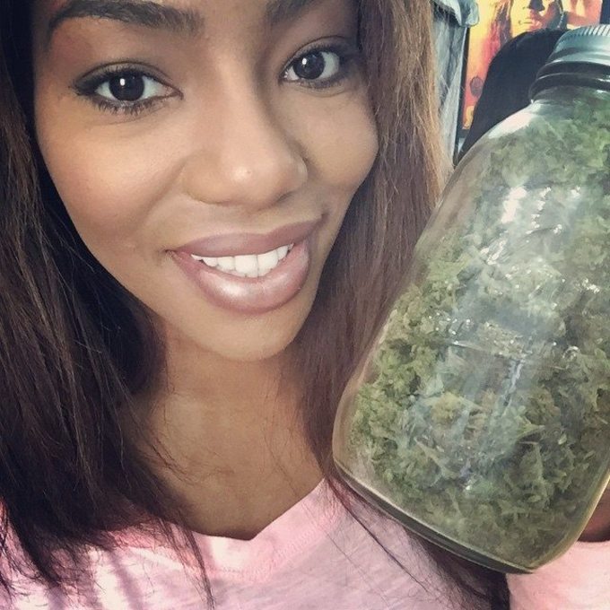 Charlo Greene with a jar of bud