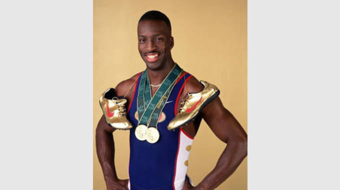 michael johnson gold sneakers