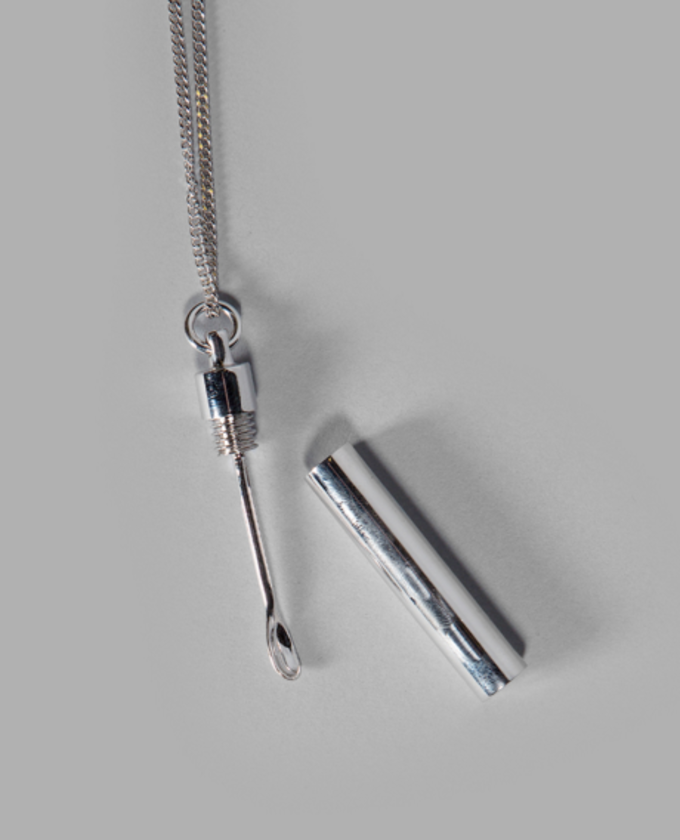 Silver necklace w/ pendant: $425 at Antonioli