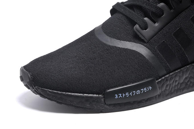 black adidas with chinese writing