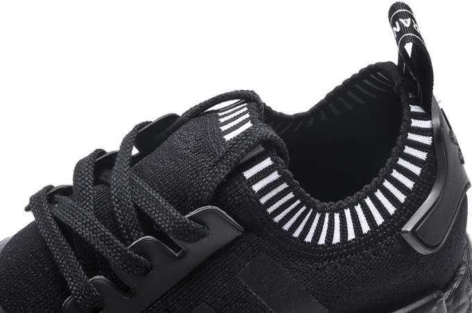 black nmds with chinese writing