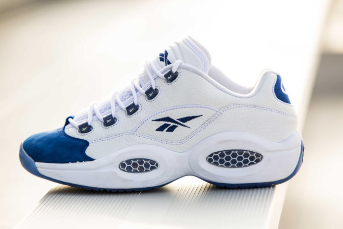 reebok classic leather sneakers in white with blue details