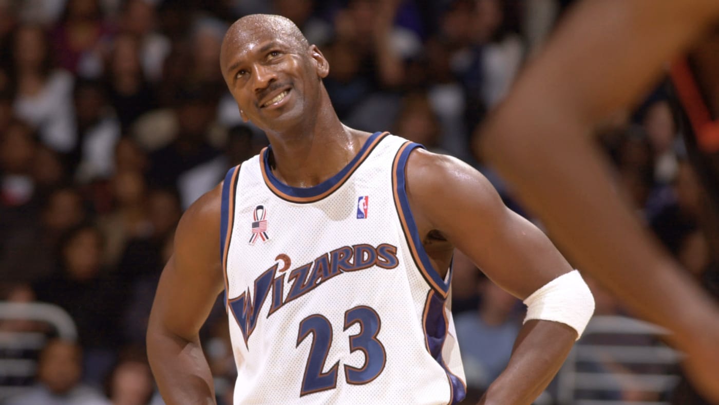 Michael Jordan #23 of the Washington Wizards smiles as he picks up 20 points against the Philadelphia 76ers