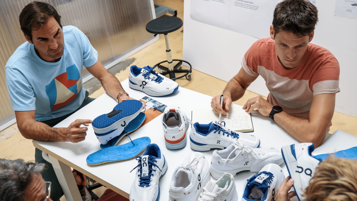 Roger Federer works on designing sneakers at On's HQ