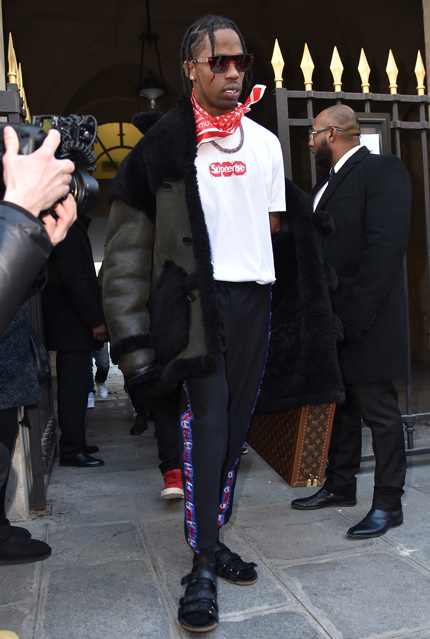 ic: Travis Scott at Paris Fashion Week Fall/Winter 2017/2018, Image via Getty/Jacopo Raule