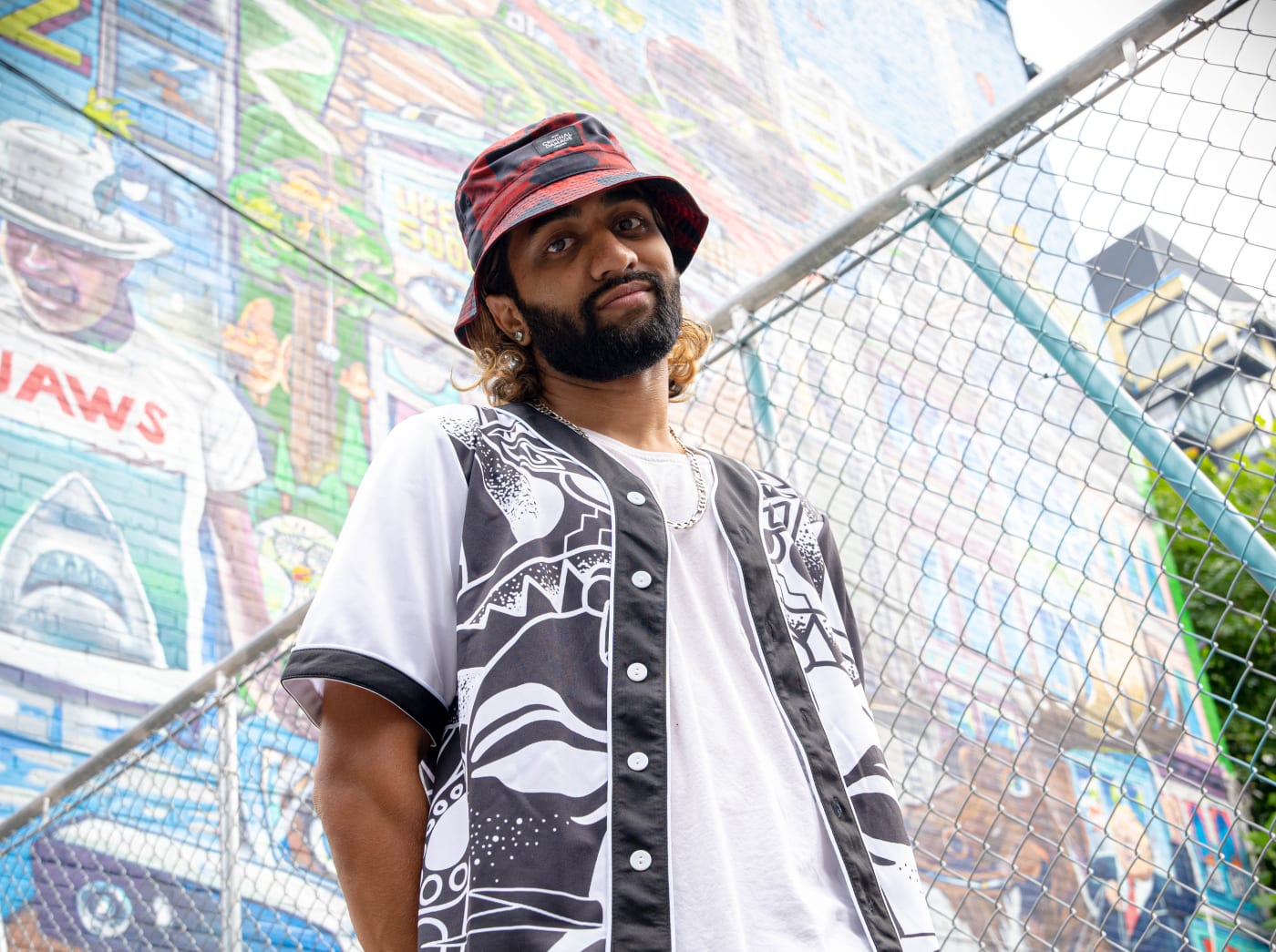 Brampton artist spitty outside