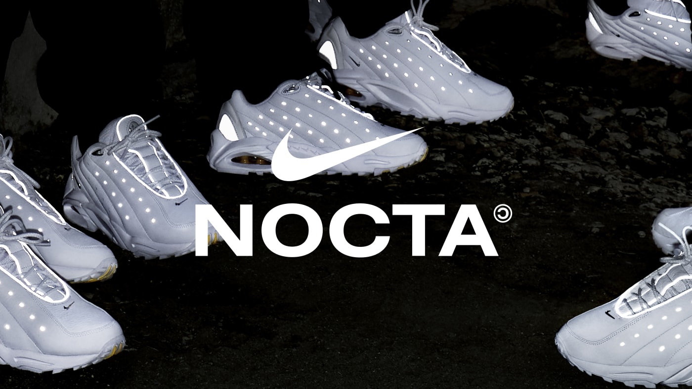 The triple white Nike Nocta Hot Step sneakers from Drake on feet