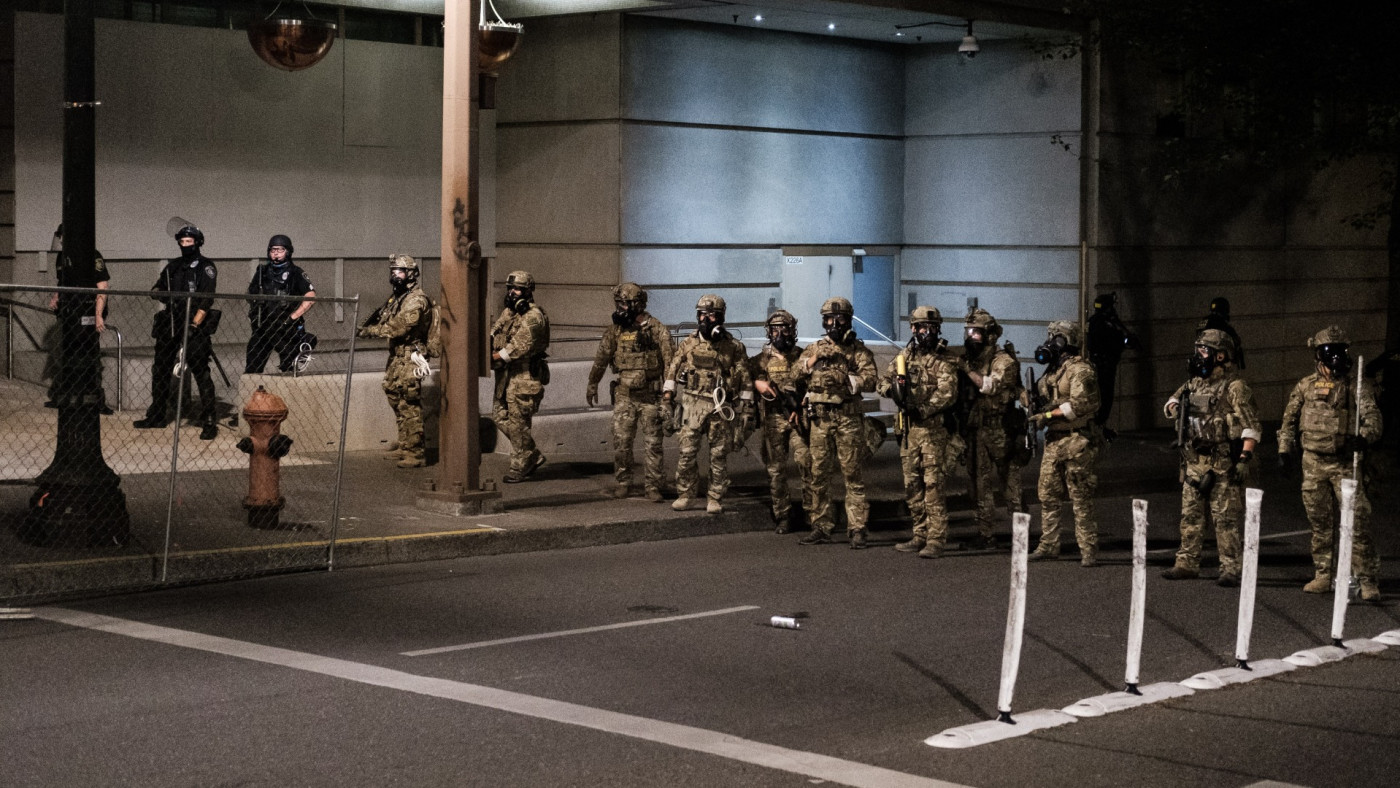 Wall Of Moms Guards Protesters Against Federal Cops In Portland Complex