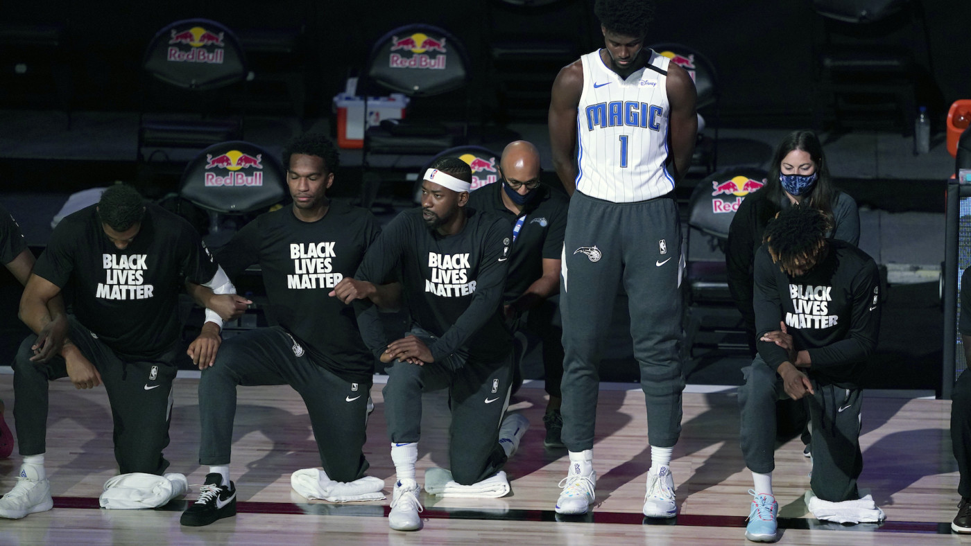 Jonathan Isaac kneeling