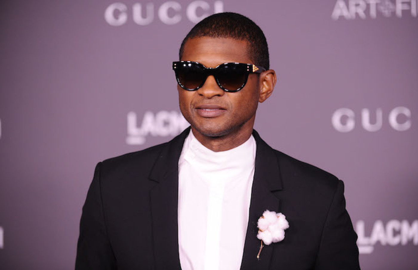 Usher’s Herpes Accuser Sues Insurance Companies Over