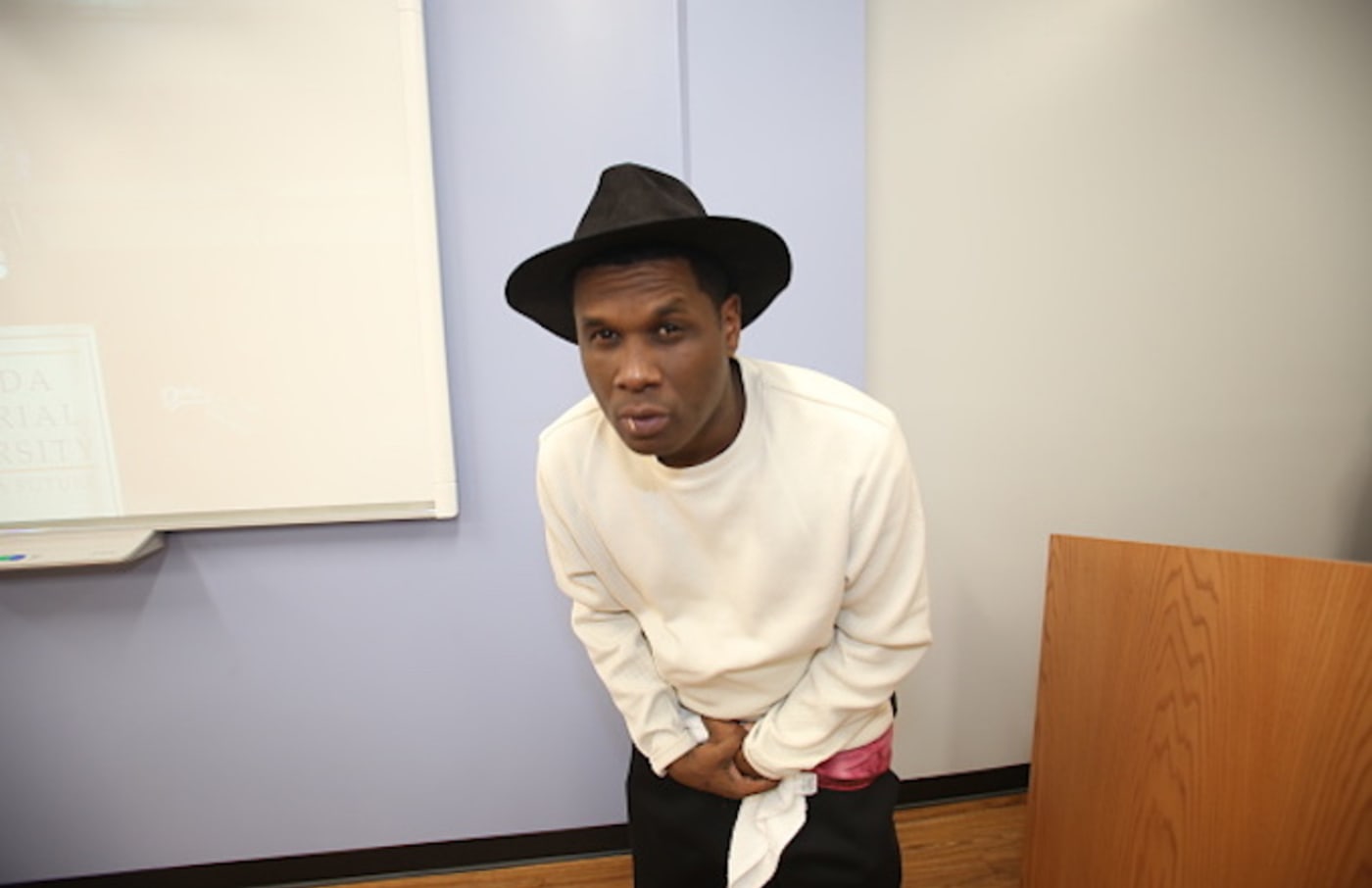 Jay Electronica poses backstage at Florida Memorial University