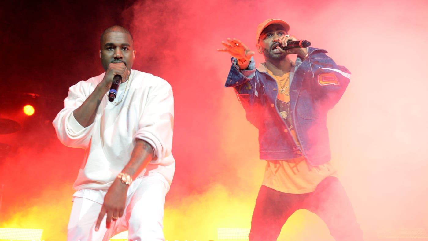Ye and Big Sean perform together.