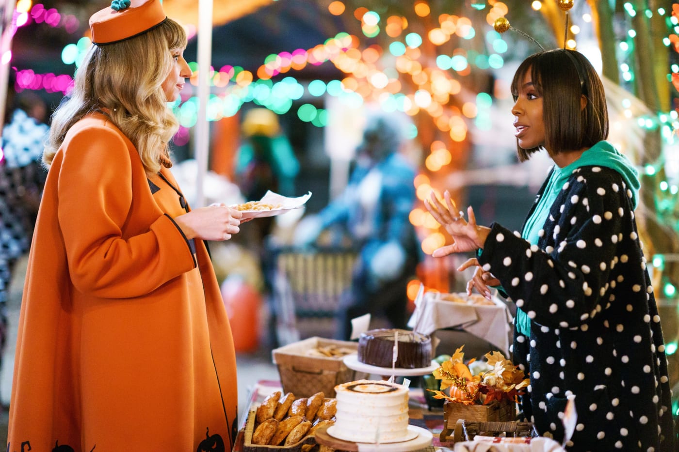 Two women are at a costume party.