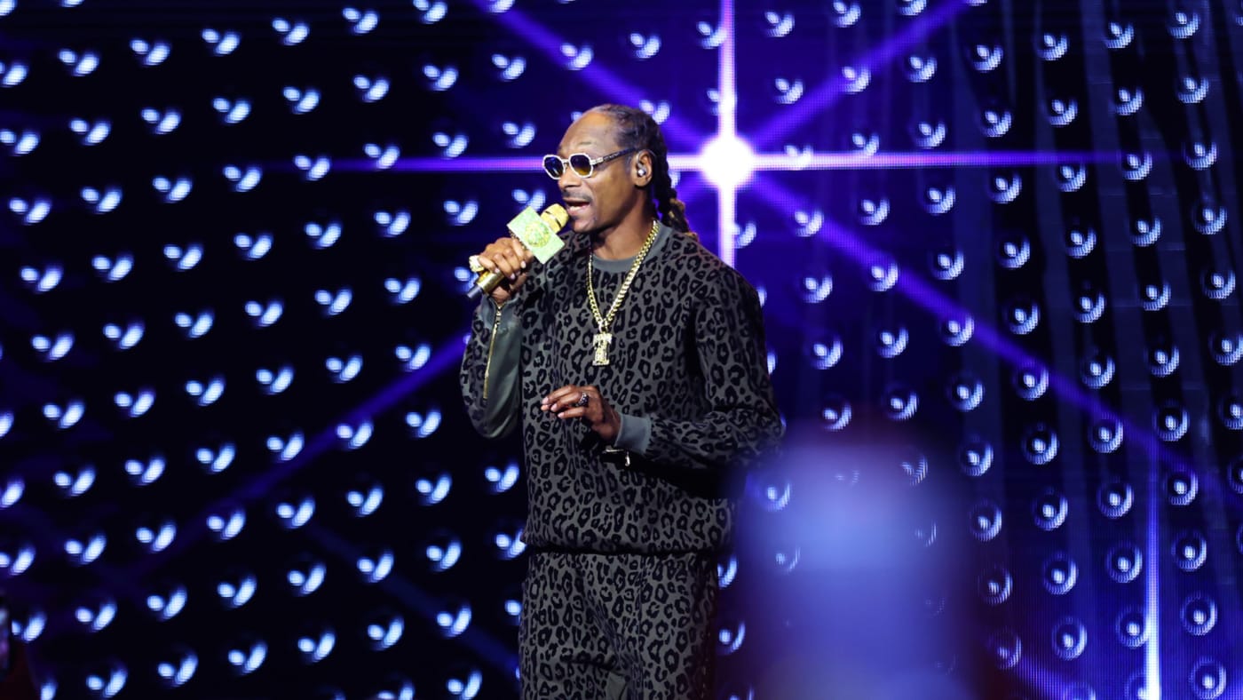 Snoop Dogg is pictured on a stage