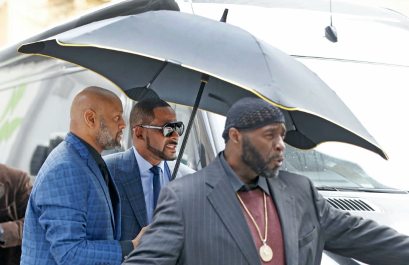 Singer R. Kelly arrives at the Daley Center for his hearing on child support