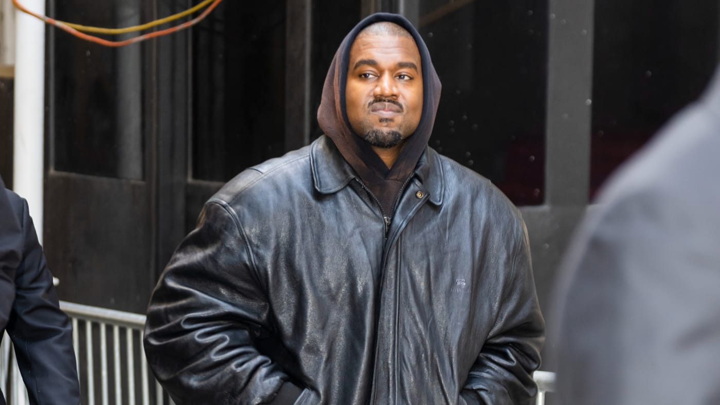 Ye is seen walking the streets in a jacket