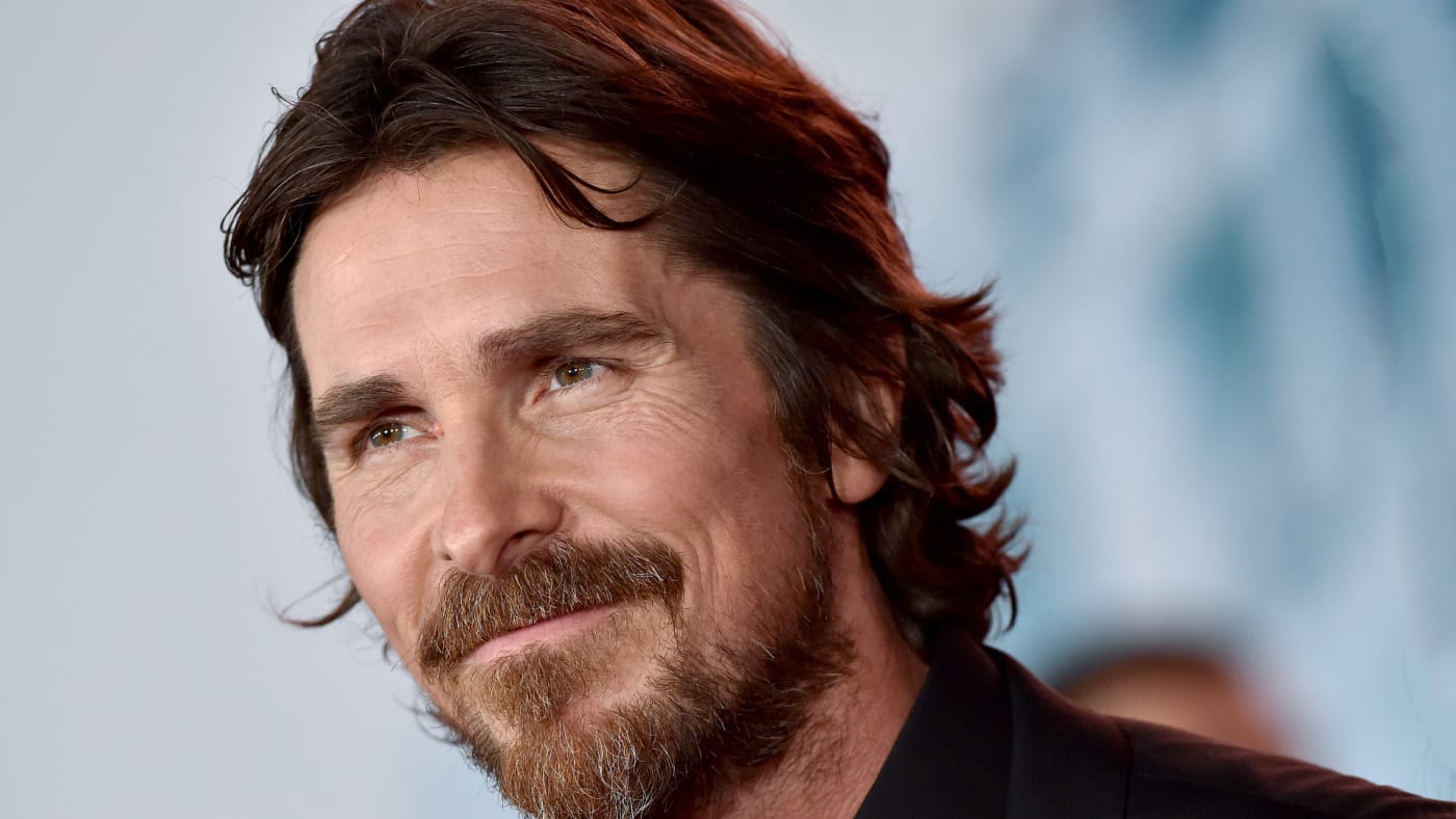 Christian Bale attends movie premiere.