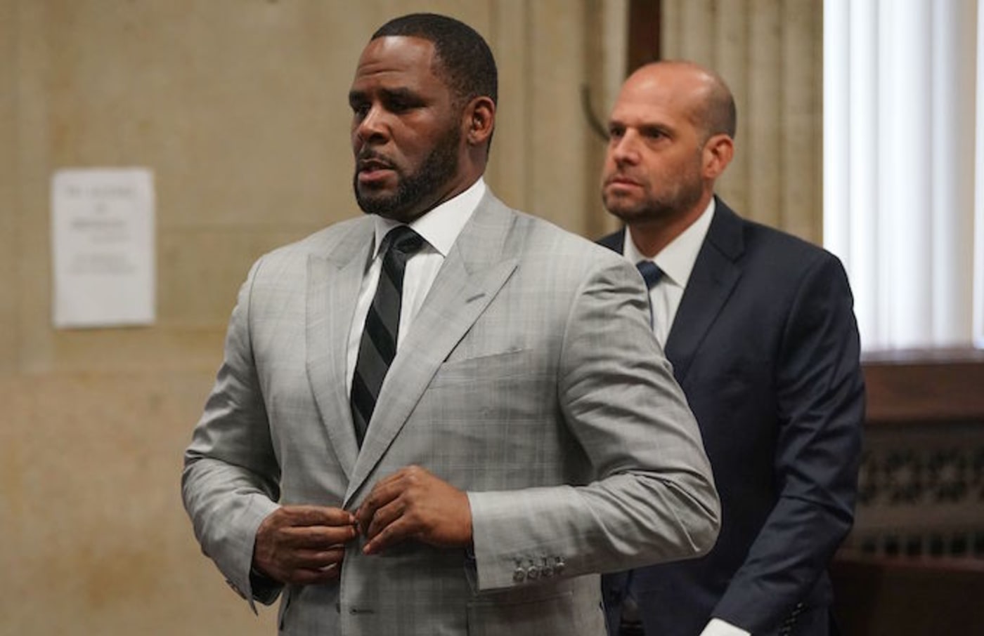 R. Kelly pleads not guilty to a new indictment before Judge Lawrence Flood.