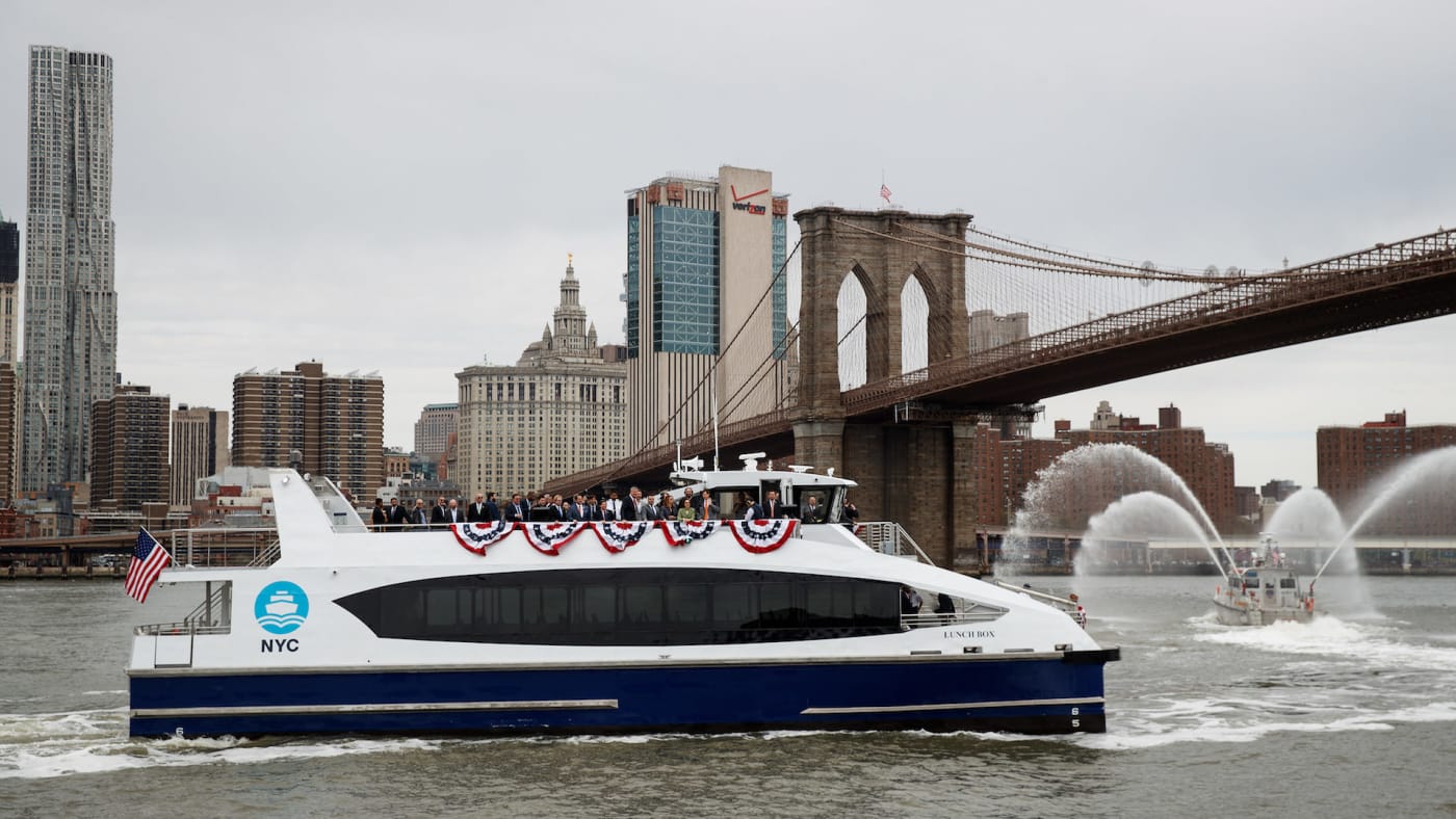 A new NYC Ferry boat arrives at Brooklyn Bridge Park for a dedication ceremony.
