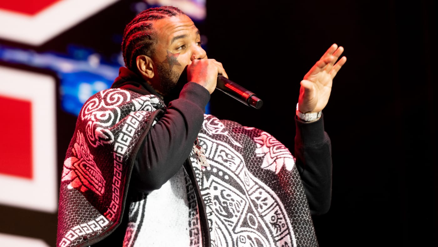 The Game performs at a music festival