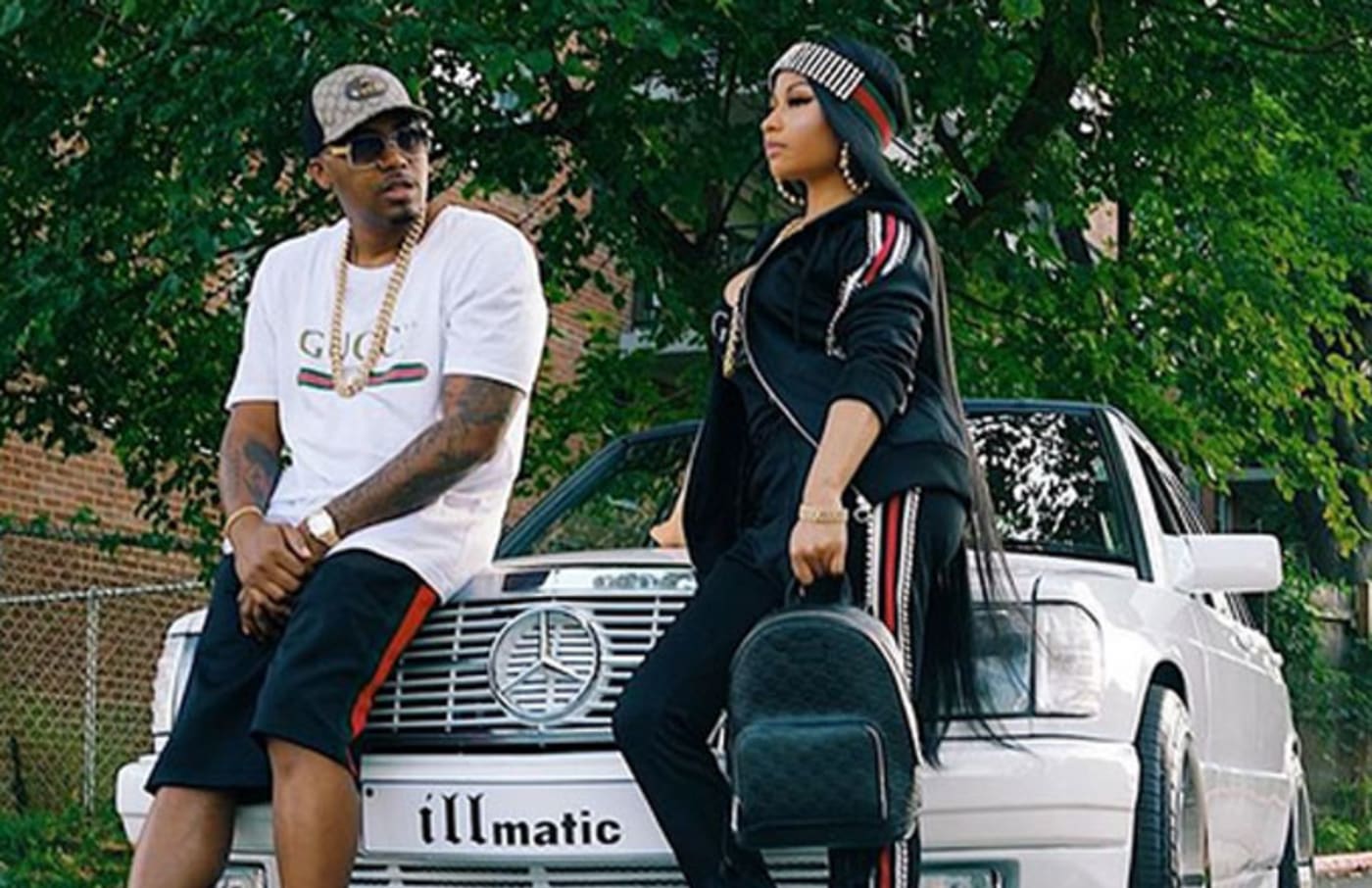 Nicki Minaj and Nas pose in front of an 'illmatic' Mercedes for Instagram.