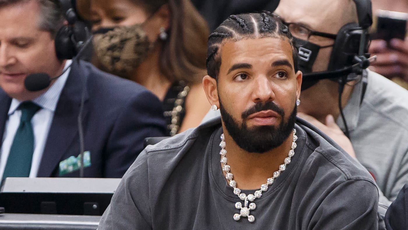 Rapper Drake reacts at an NBA game between the Toronto Raptors and the Los Angeles Lakers